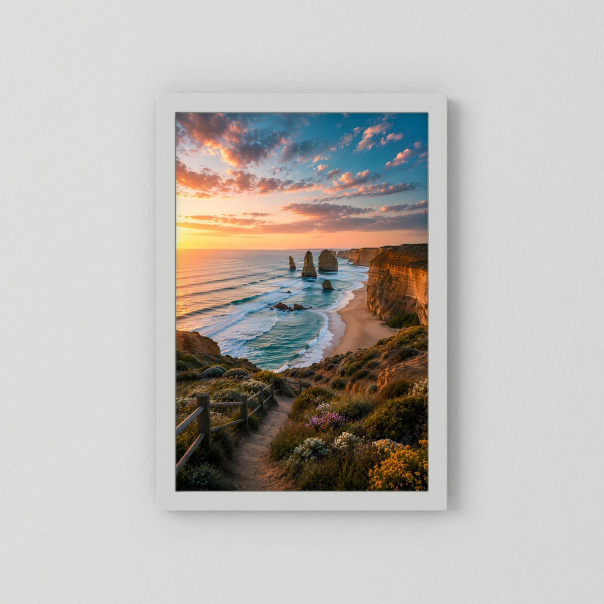 Hochformat-Poster ohne Rahmen: Sonnenuntergangsküste mit Felsnadeln, Strand und blauem Wasser.