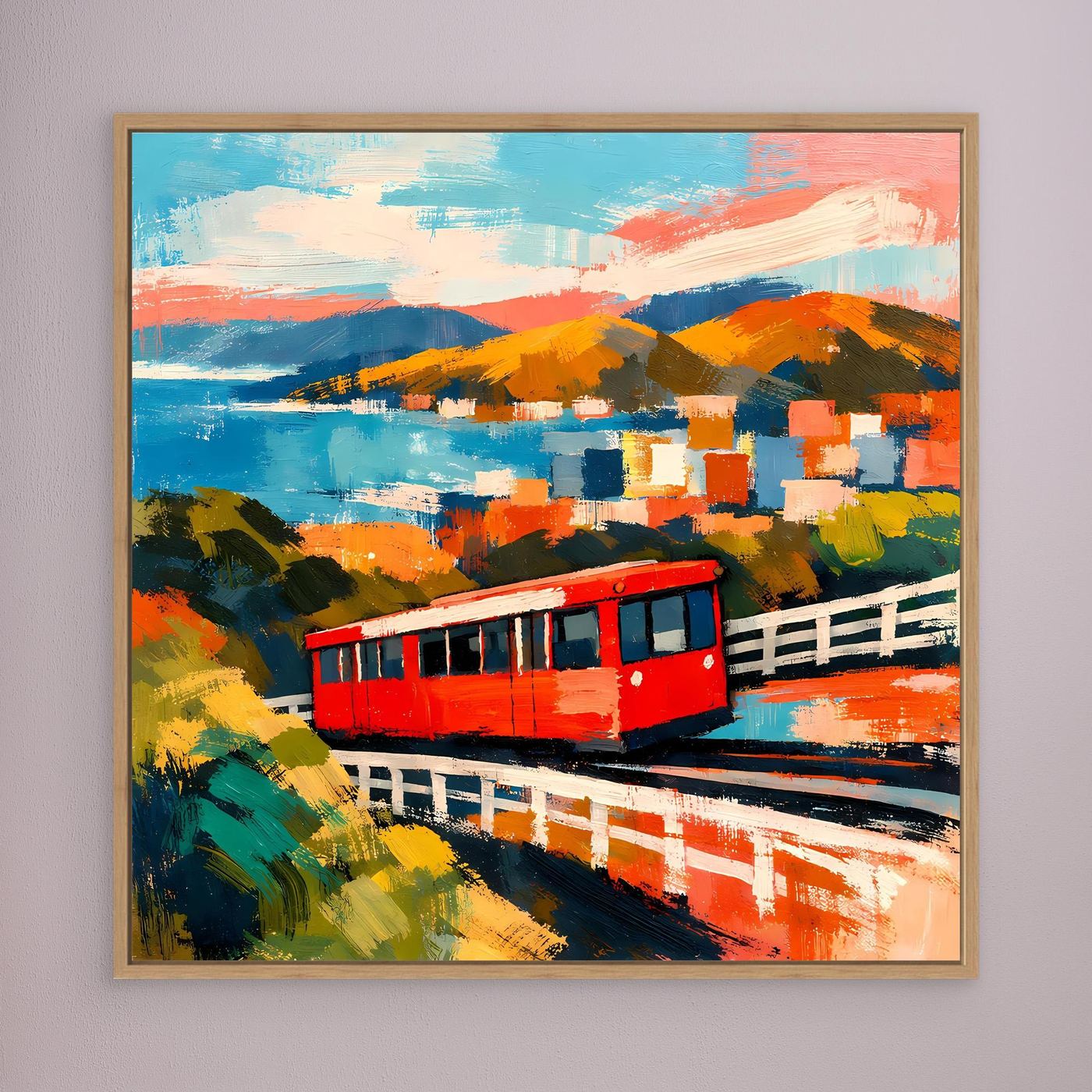 Gerahmtes Wandbild mit roter Seilbahn auf Brücke vor bunten Landschaftsflächen