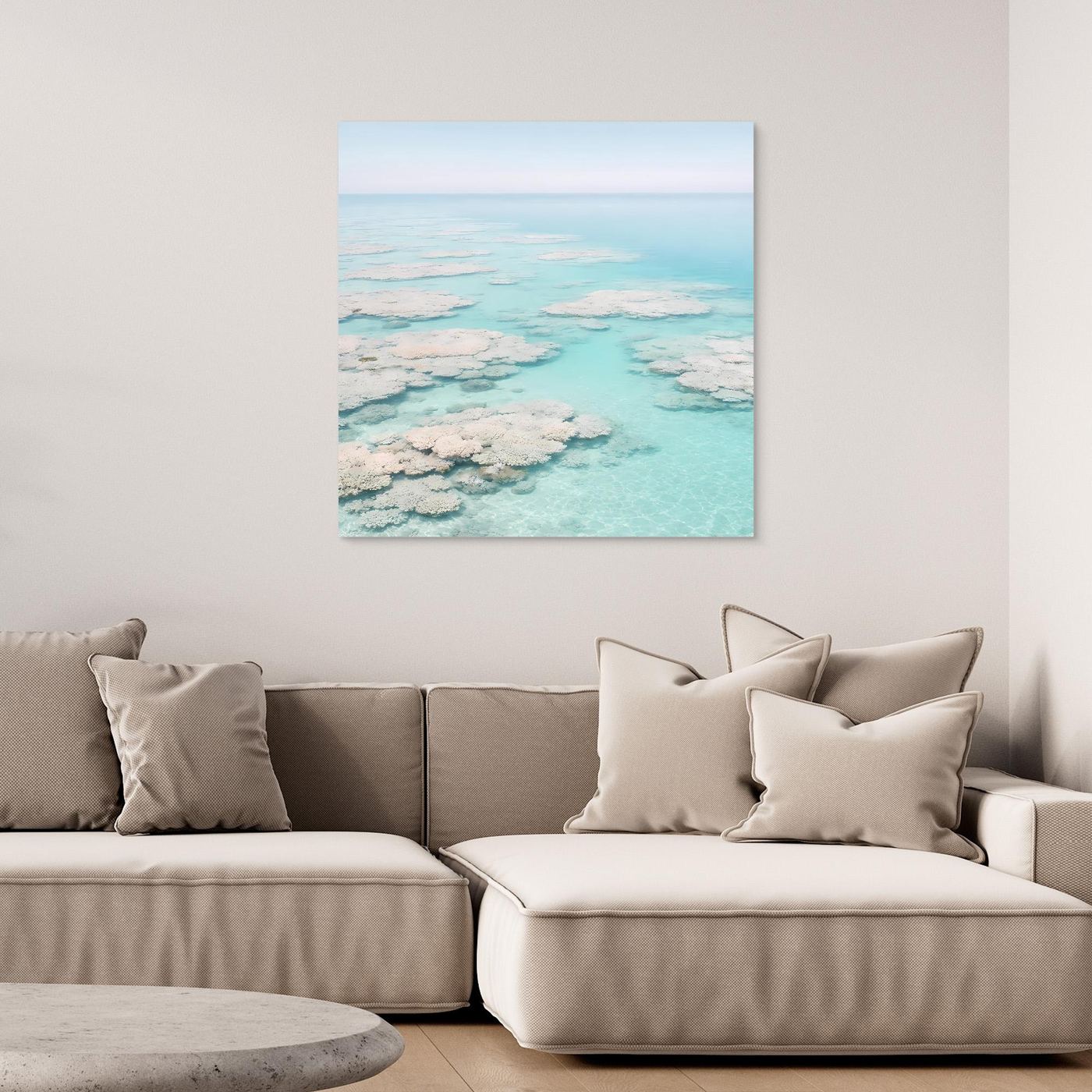 Quadratisches Leinwandbild mit türkisfarbenem Korallenmeer, weißer Rahmenkante
