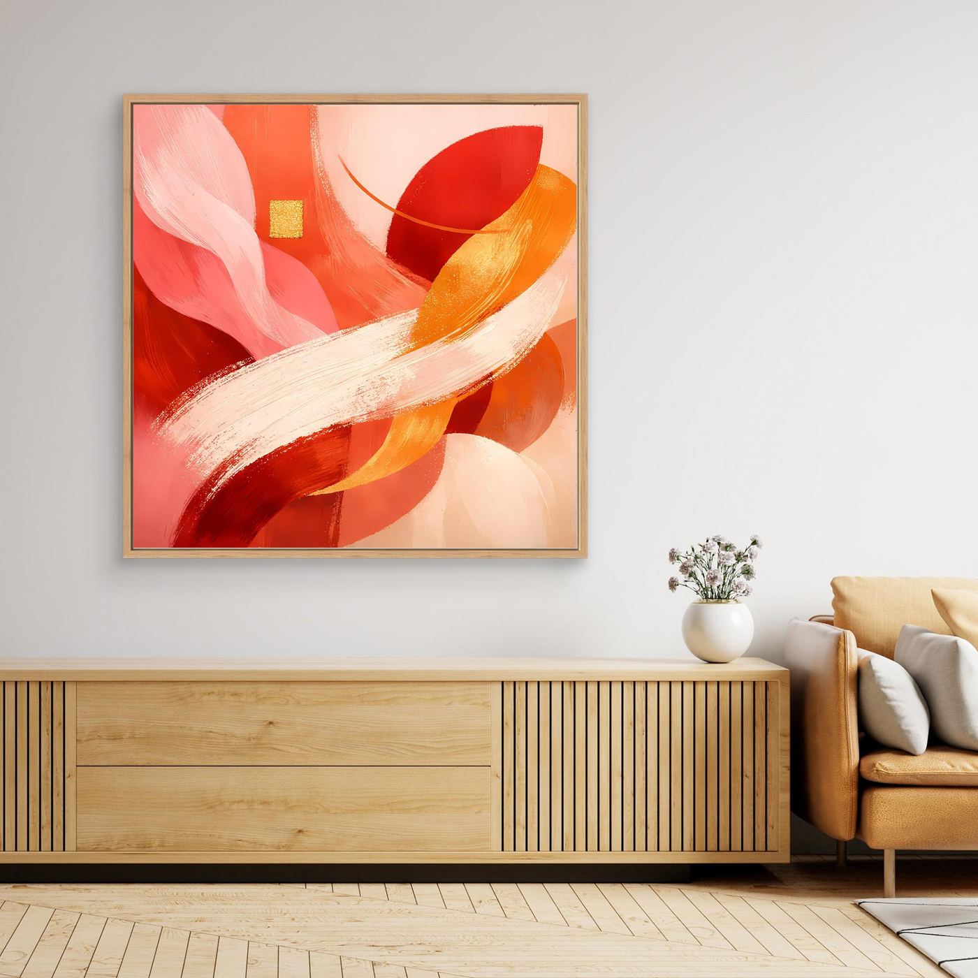 Abstraktes Leinwandbild in warmem Rot-Orange-Gold mit goldfarbenem Rahmen und Pinselstrichen