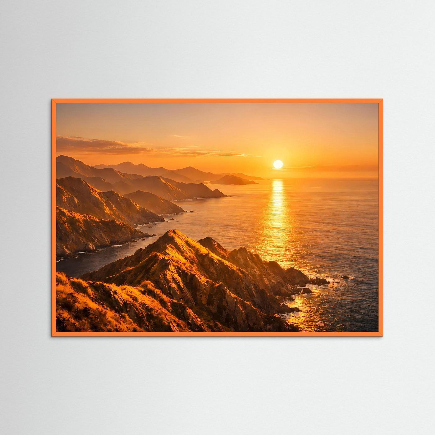 Wandbild mit Sonnenuntergang über Küstenfelsen, orangefarbener Rahmen