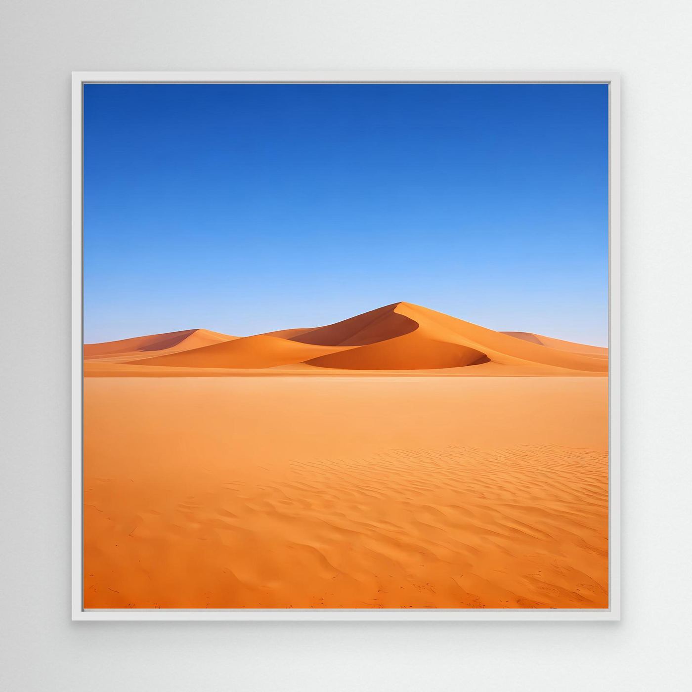 Leinwandbild mit Sanddünen in Orange und Blau, weißer Rahmen