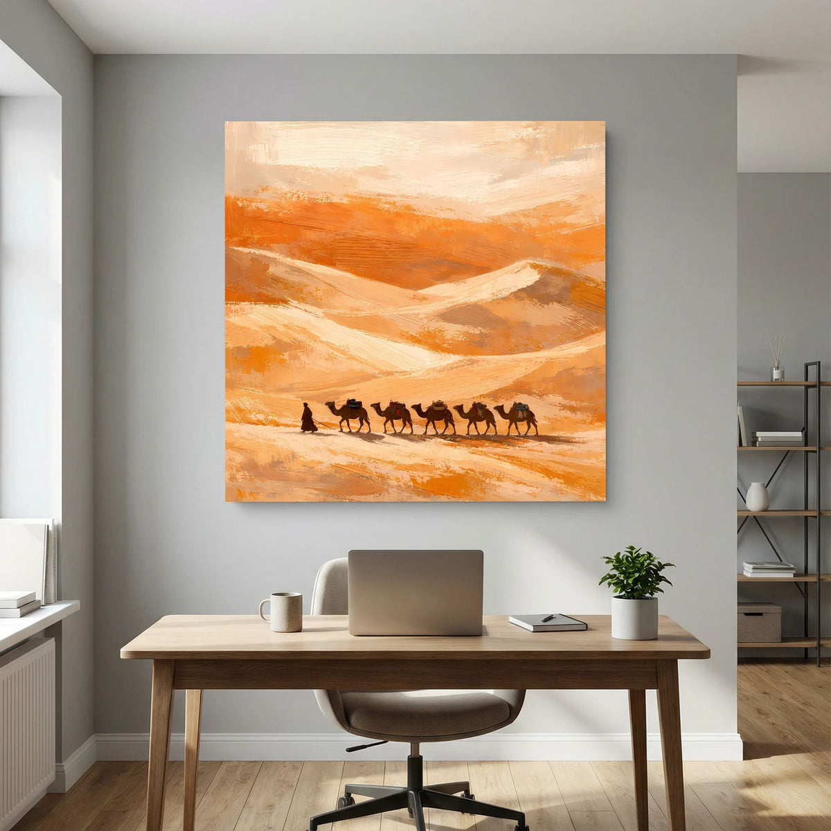 Leinwand-Wandbild mit hellem Holzrahmen: abstrakte Sanddünen, dunkle Kamelgruppe in der Ebene