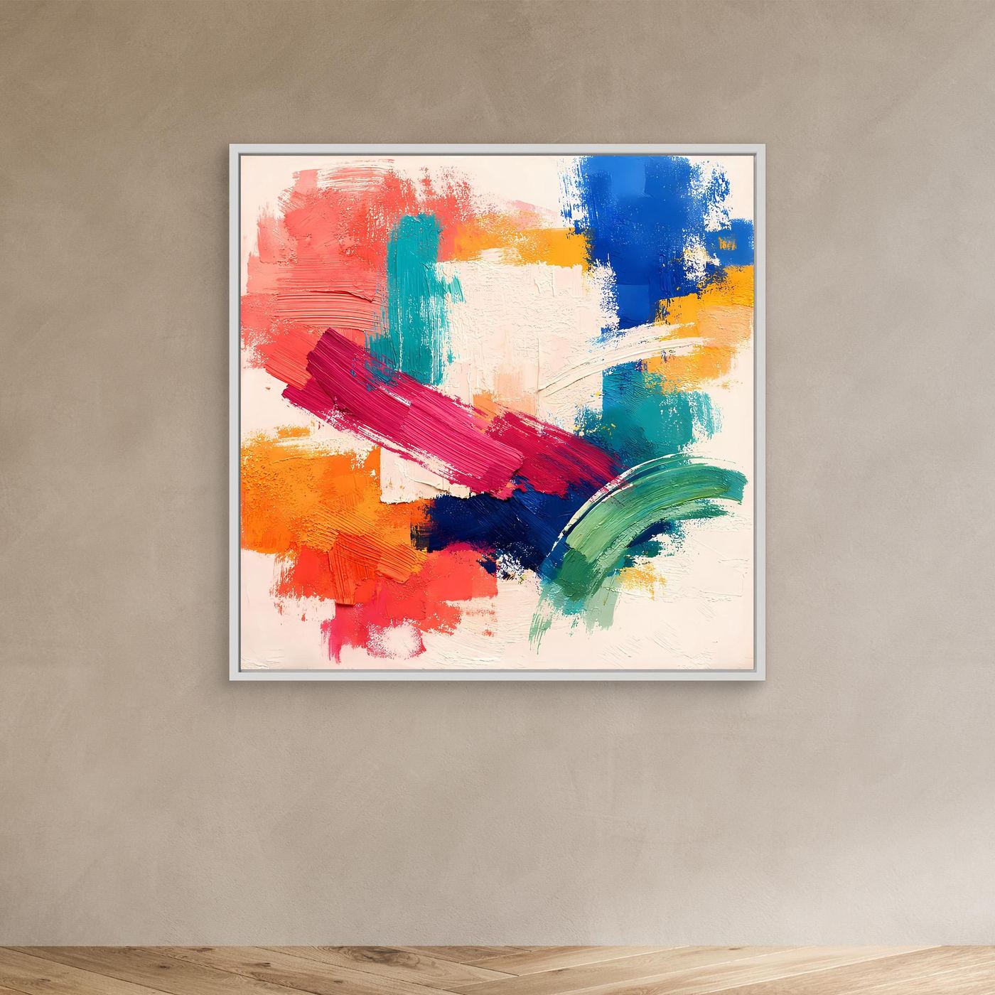 Abstract canvas wall art in a white frame with red, blue, green, yellow paint accents