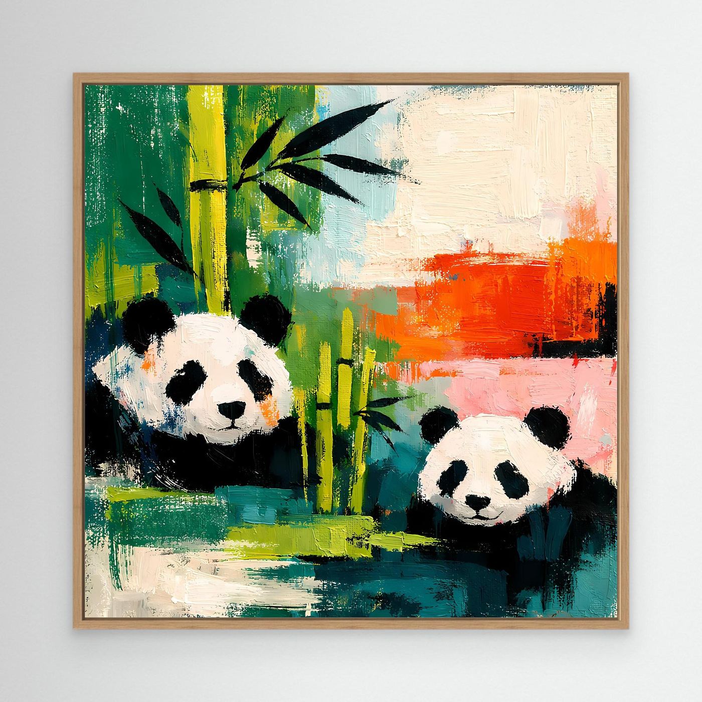 Oak-framed canvas wall art with two pandas among painted bamboo and teal orange accents.