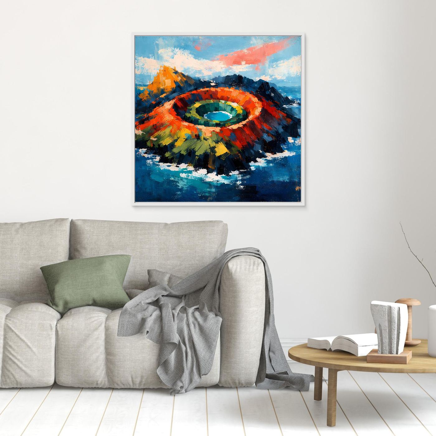 Kleines gerahmtes Leinwandbild mit Vulkankrater im Meer, hell gerahmt, Farbwirbel in Blau.