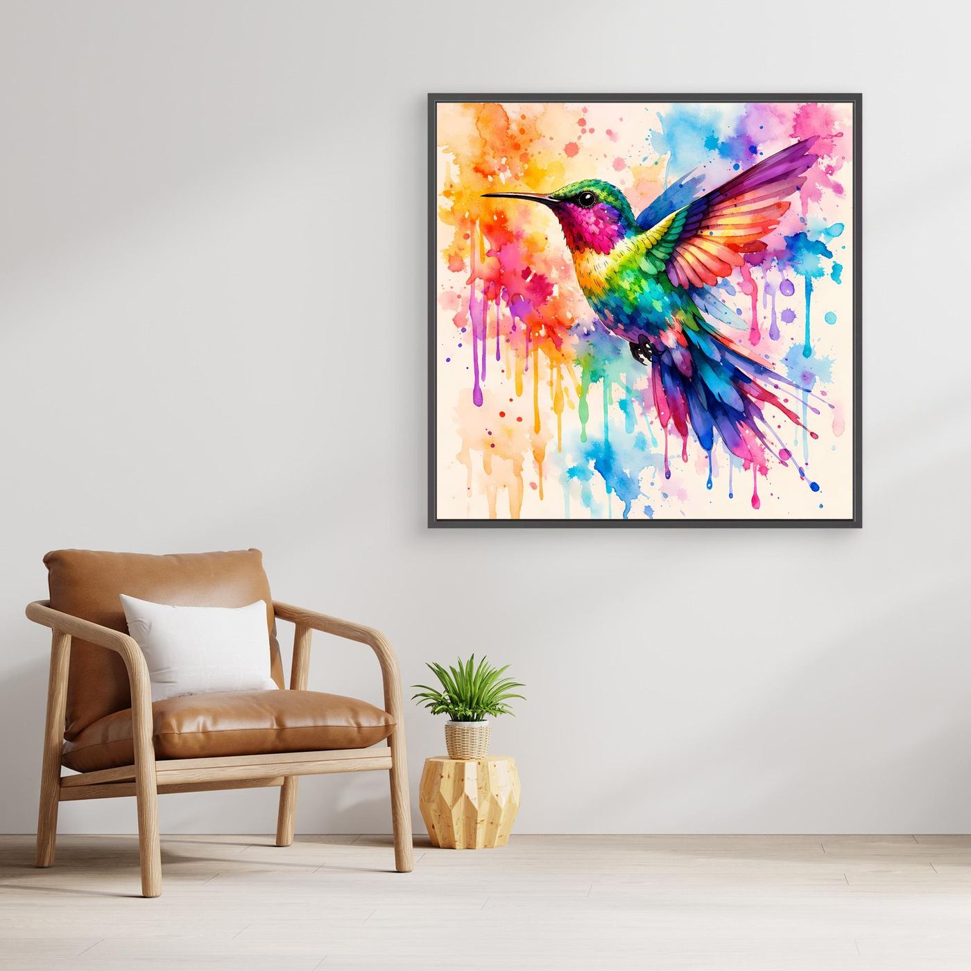 Leinwandbild Kolibri-Aquarell mit leuchtenden Farben, Spritzdekor und Tropfen, schwarz gerahmt