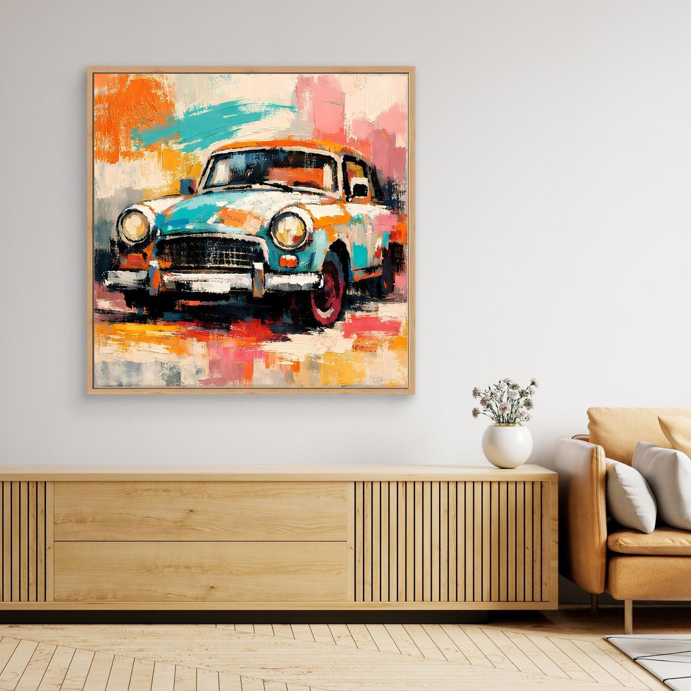 Abstract vintage car wall art with turquoise, orange, and pink brushstrokes in a light wood frame