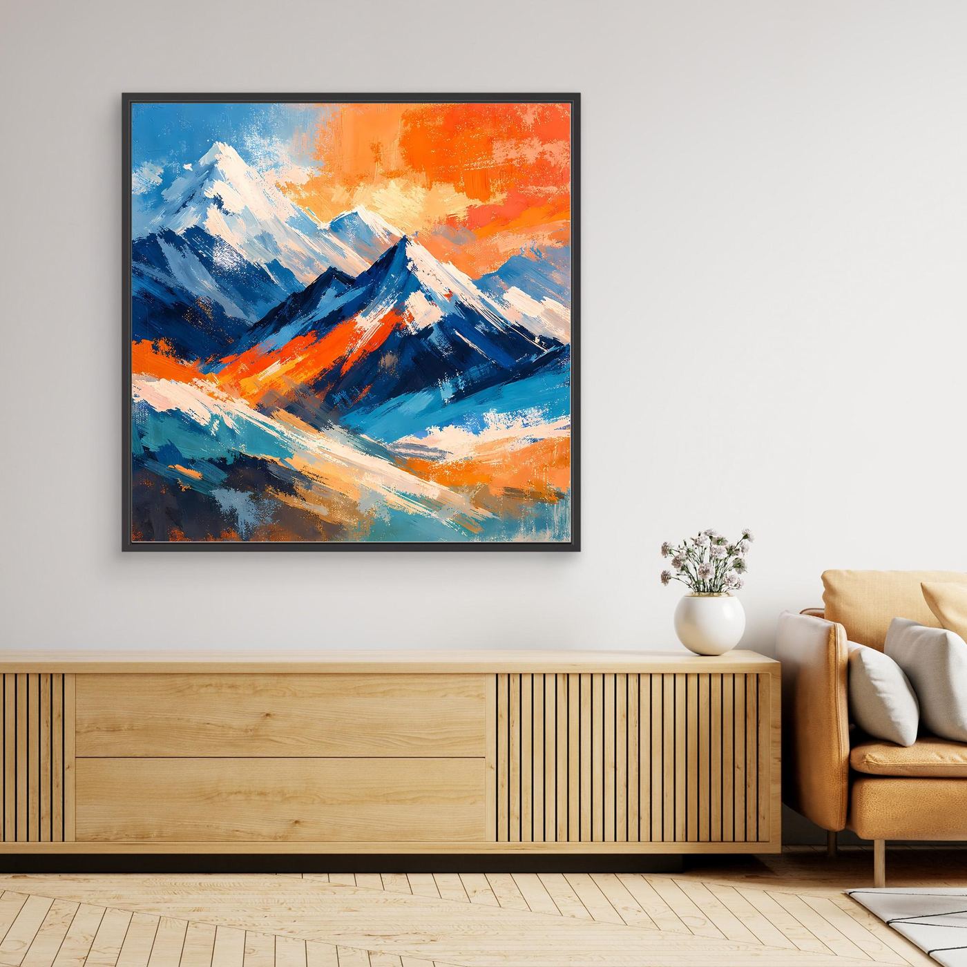 Wandbild mit abstrakten Bergen in Blau, Orange und Weiß, schwarzer Rahmen