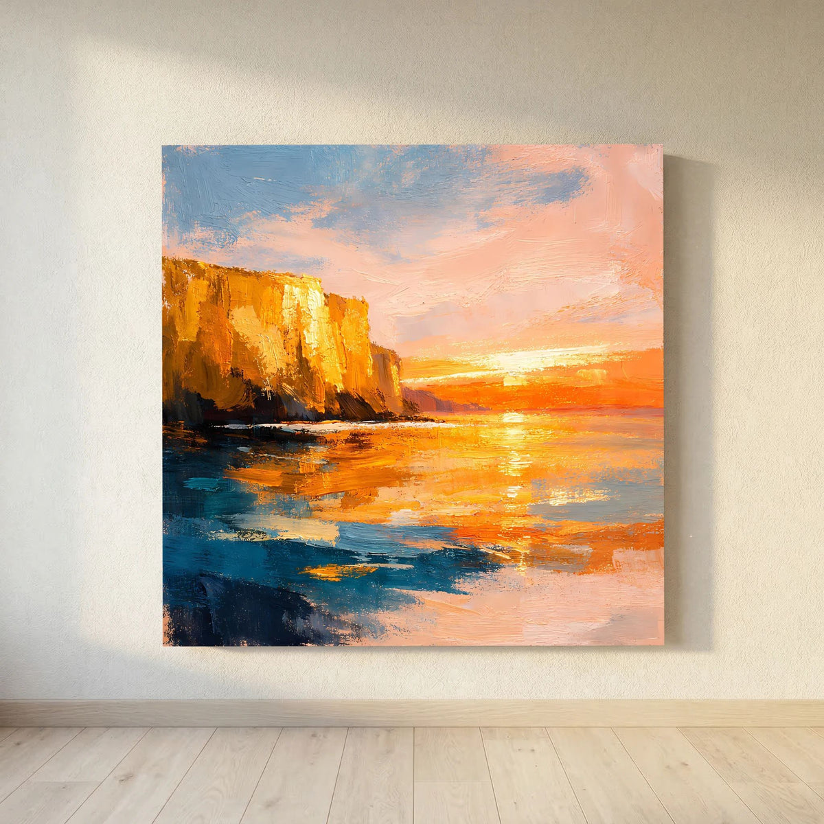 Leinwand-Wandbild: orange-goldene Küstenlandschaft mit blauem Uferwasser und Himmel