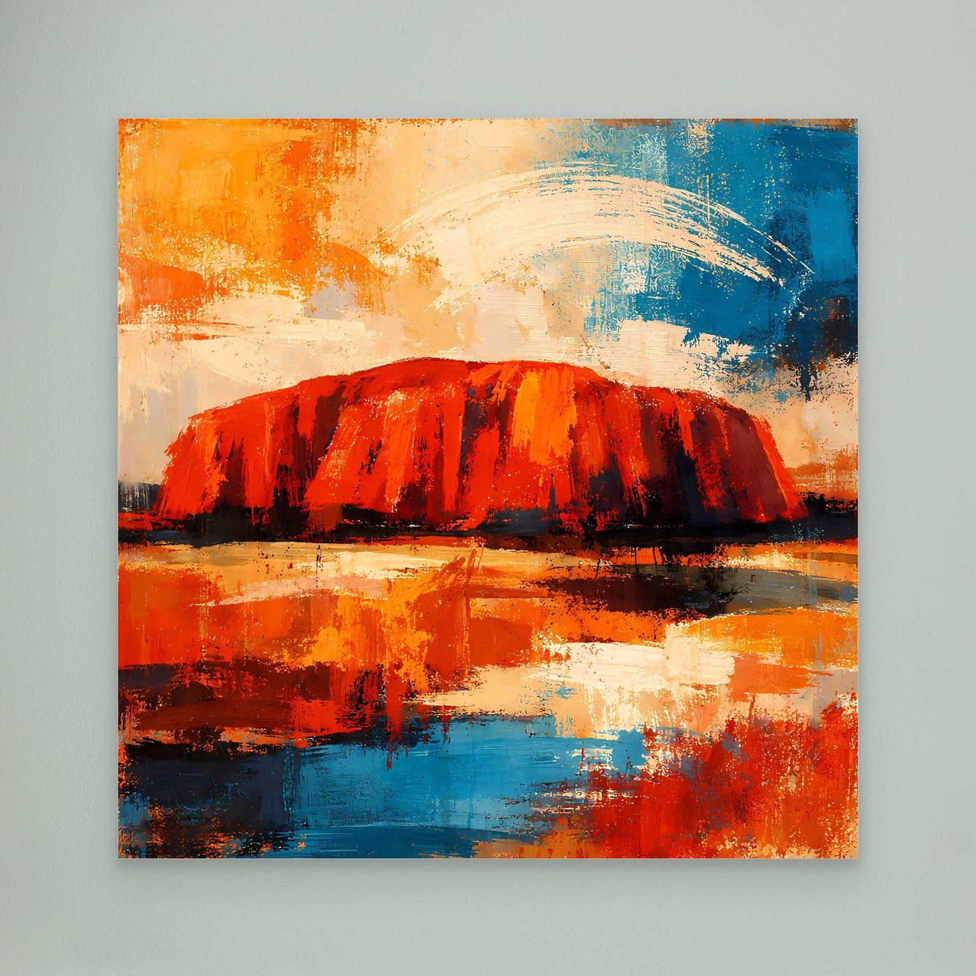 Abstraktes Leinwand-Wandbild mit Uluru-Fels und Wasserfläche in Rot/Blau.