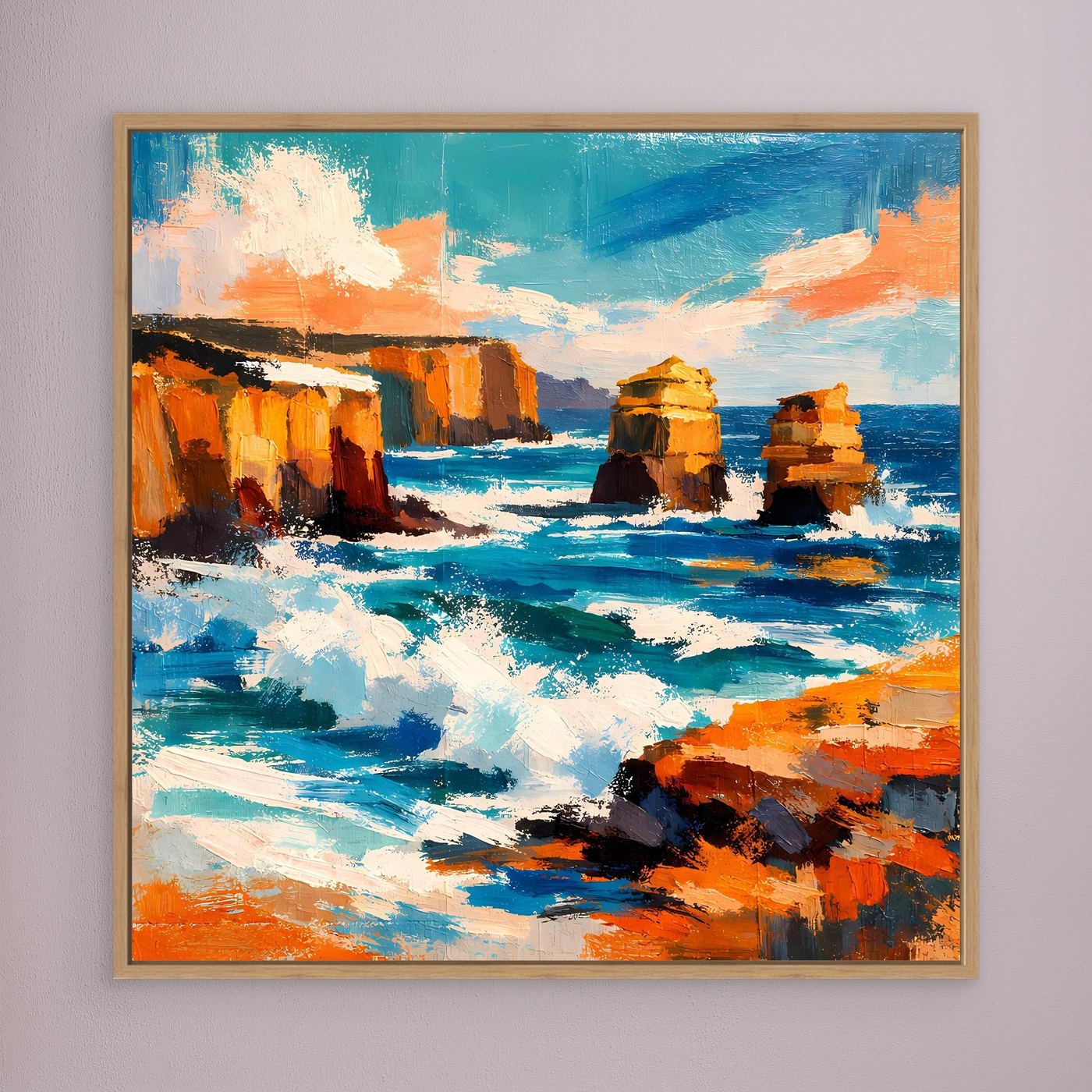 Wandbild mit abstraktem Küstenmotiv: türkisblaues Meer, orange Felsen, heller Holzrahmen