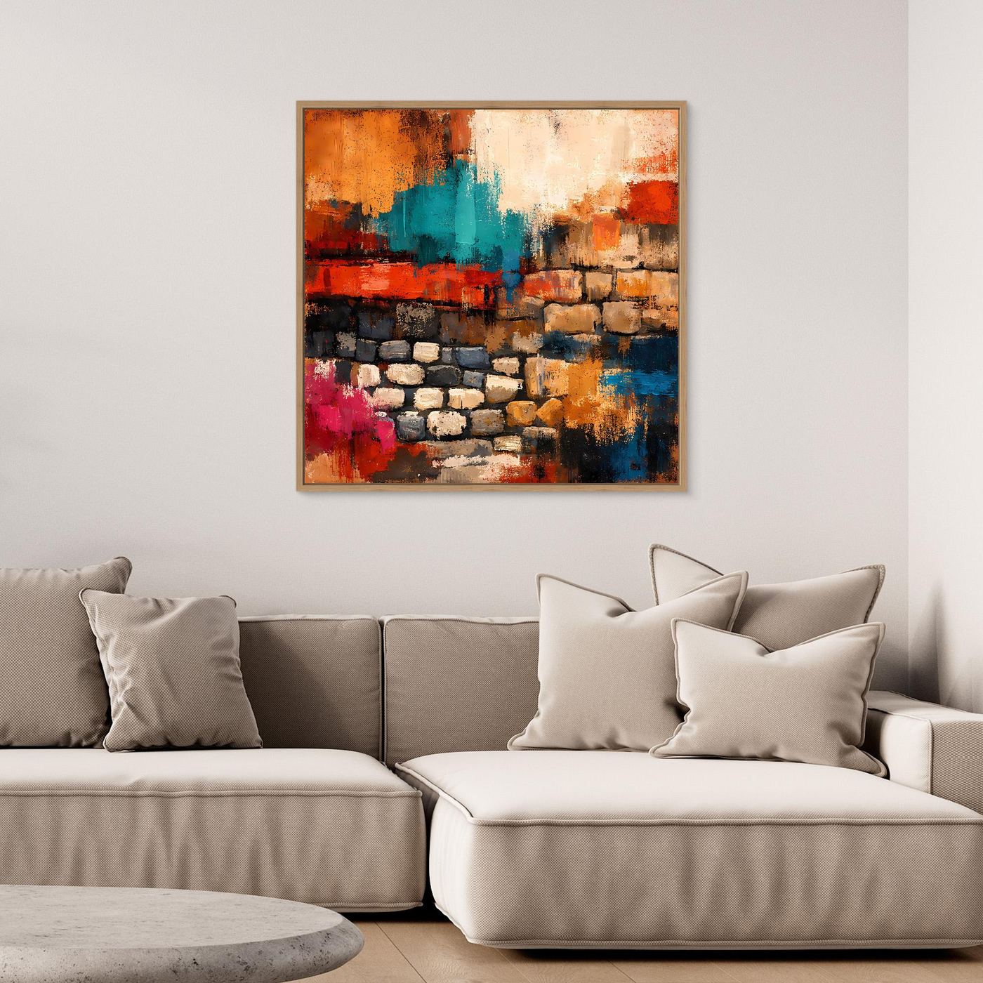 Gerahmtes abstraktes Leinwand-Wandbild: Steinmauer in warmen Farben mit Teal-, Rot- und Blautönen.