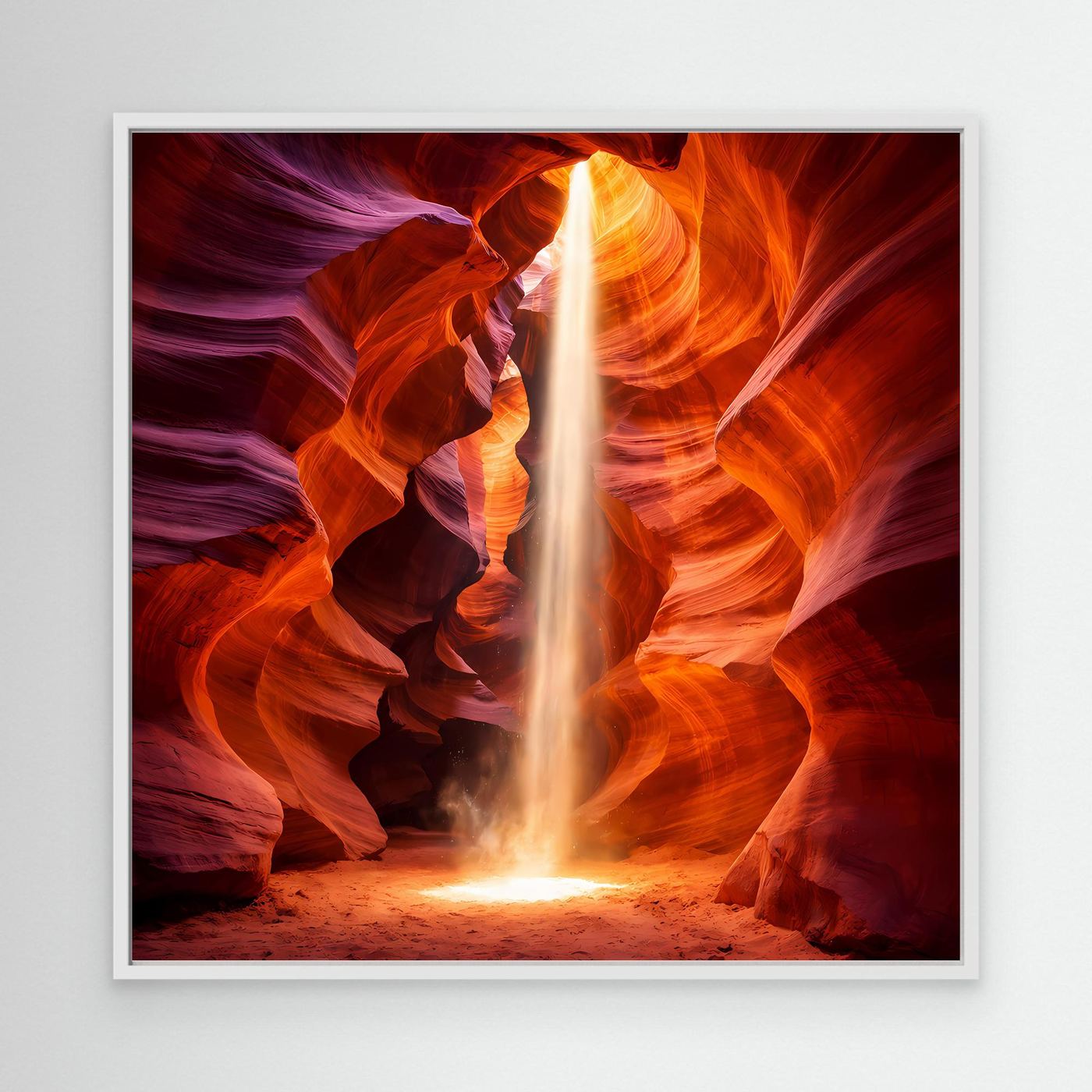 Leinwandbild mit weißem Rahmen: roter Canyon mit hellem Lichtstrahl im Fels