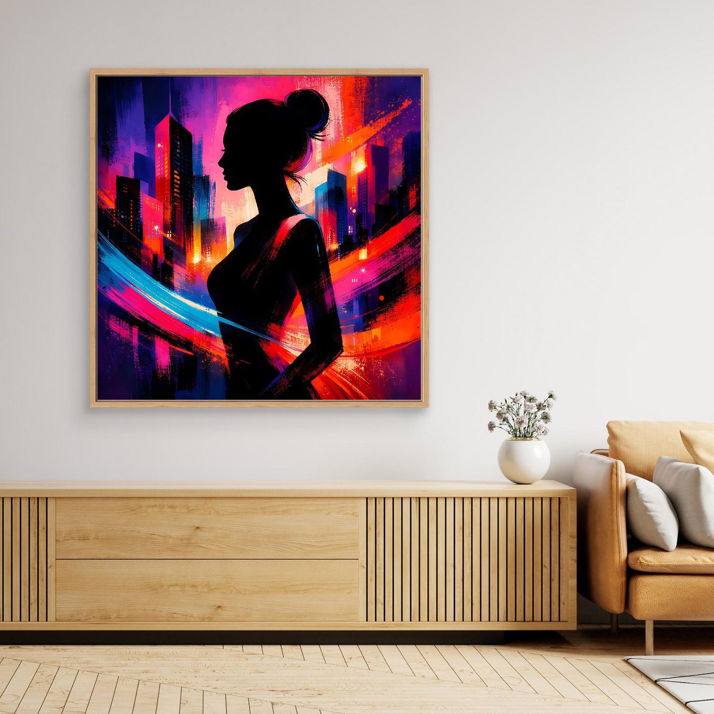 Quadratisches Leinwandbild mit Stadt-Silhouette und Frau im Profil, Neonfarben, heller Rahmen