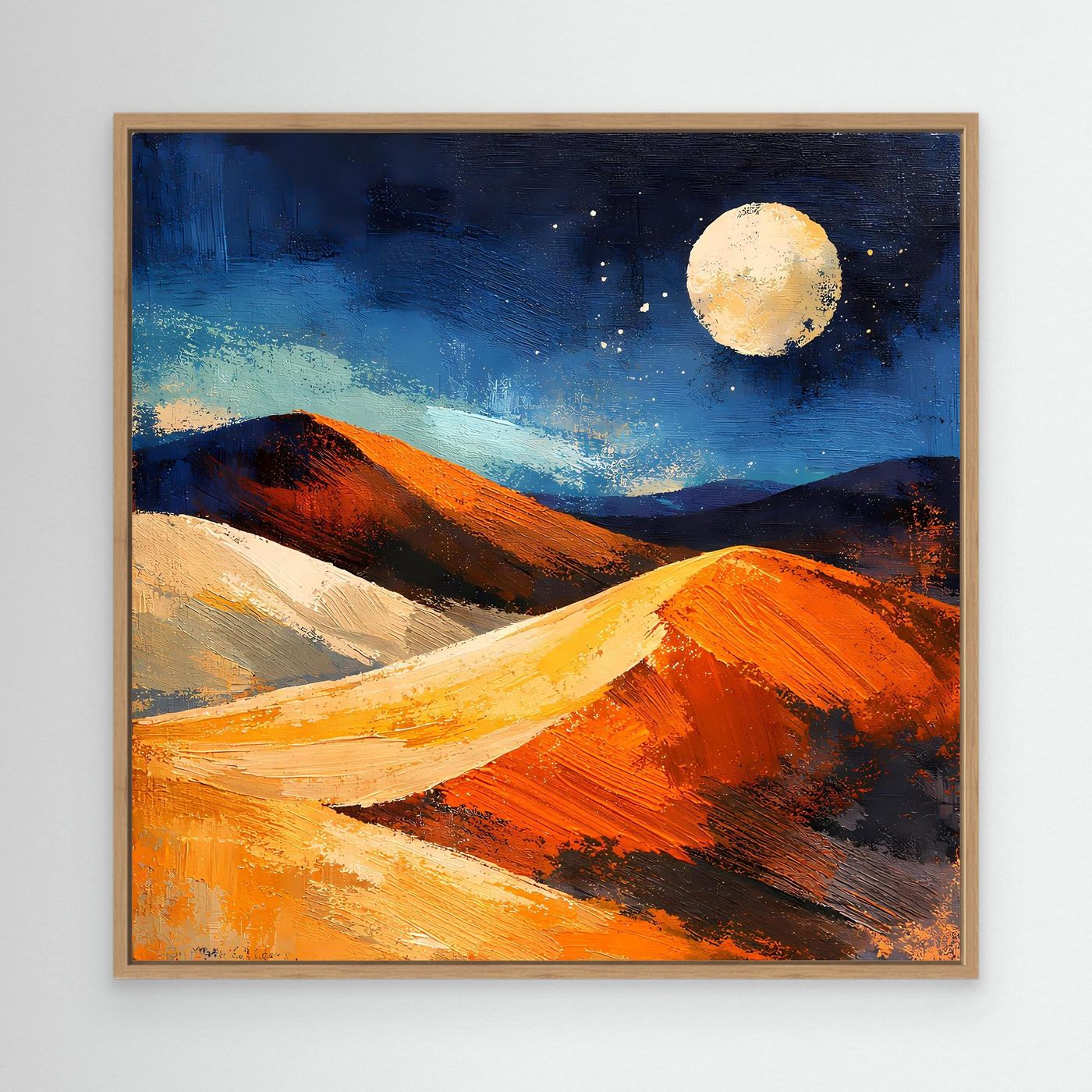 Abstract canvas wall art of moonlit desert dunes, blue and orange tones, in oak frame