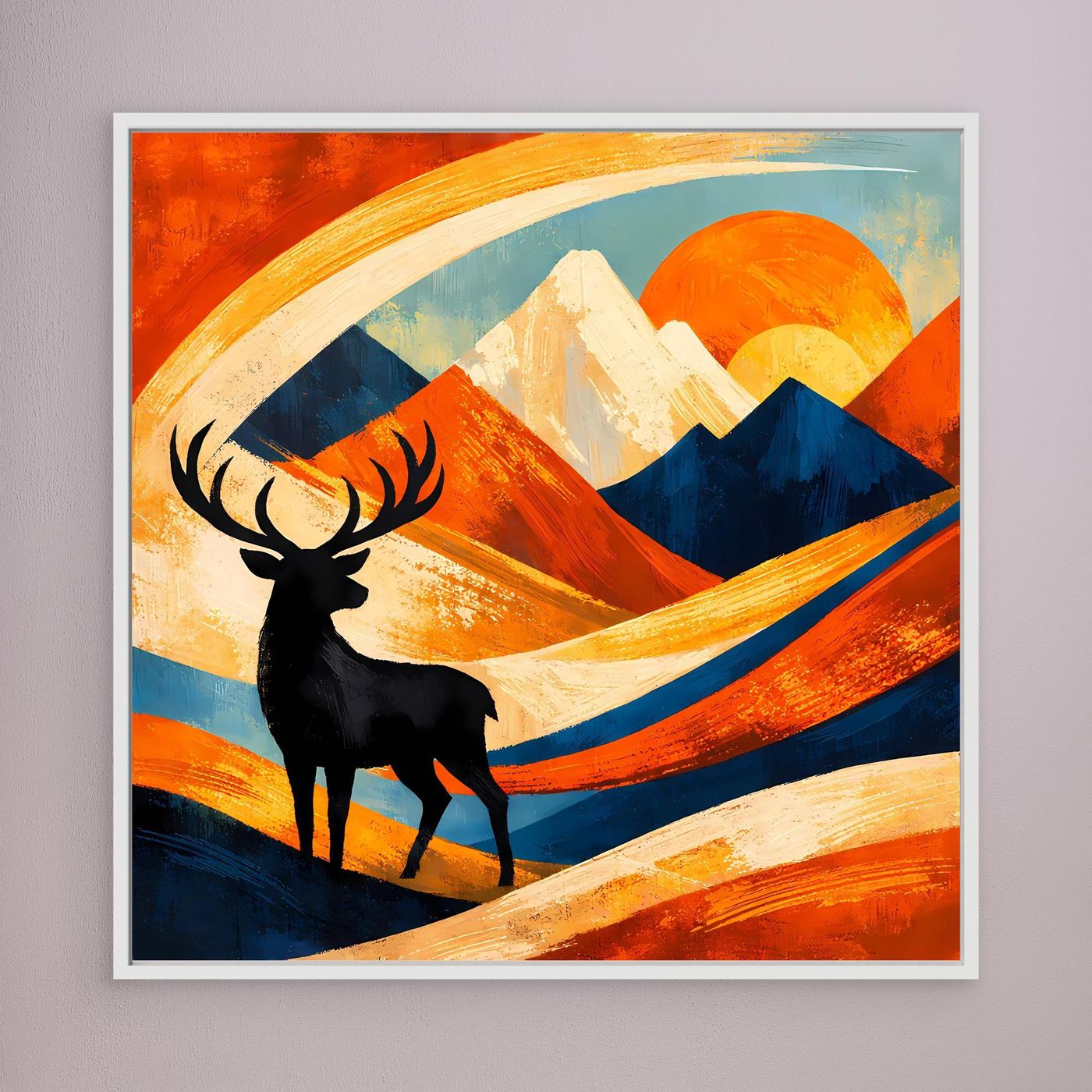 Leinwandbild mit Hirschsilhouette vor orangefarbenem Bergbogen, weiß gerahmt