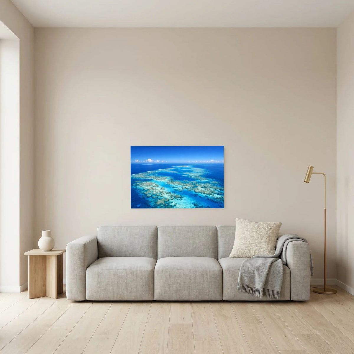 Wandbild Korallenmeer: türkisblaues Wasser und Riffe, heller Himmel über dem Meer