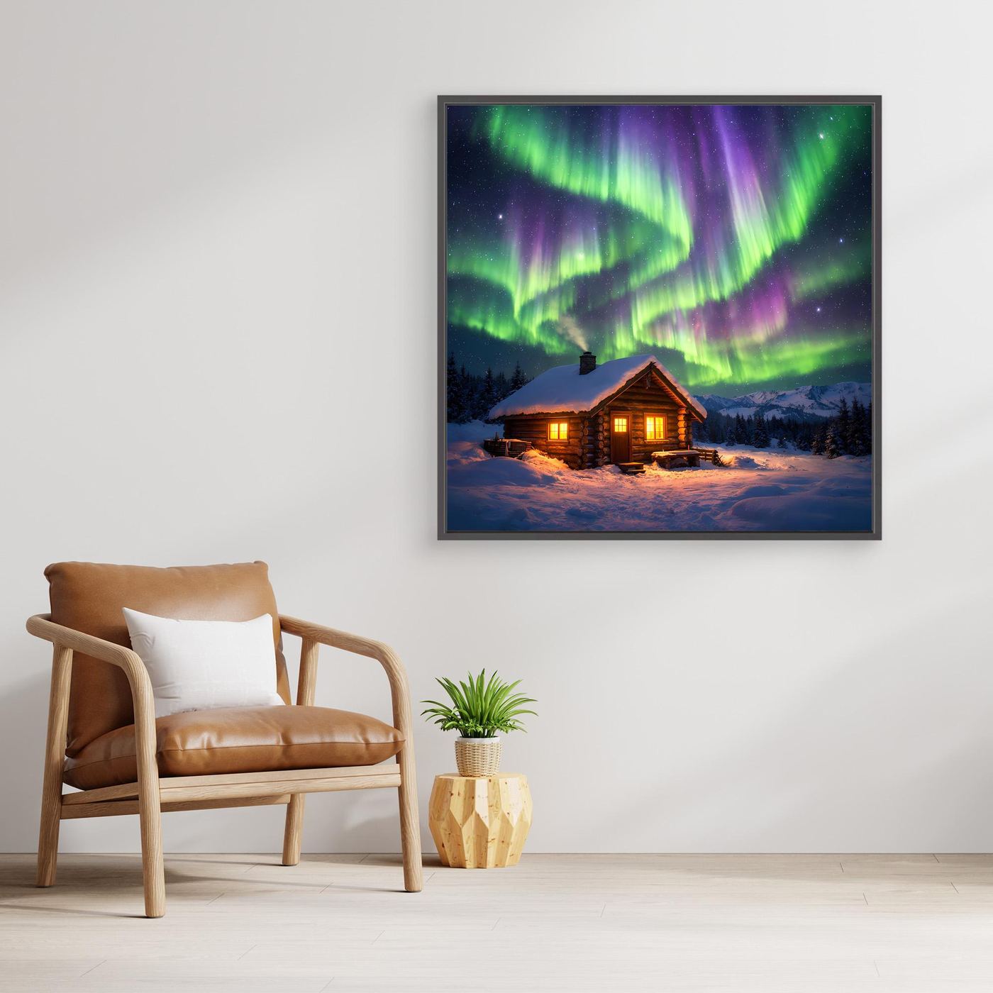 Leinwandbild mit Rahmen: Polarlichter und eine beleuchtete Hütte im verschneiten Winter