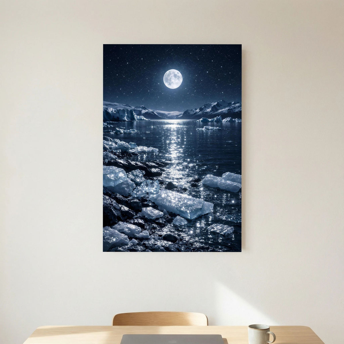 Wandbild Hochformat mit Vollmond über einer eisigen Wasserfläche und Felsbrocken