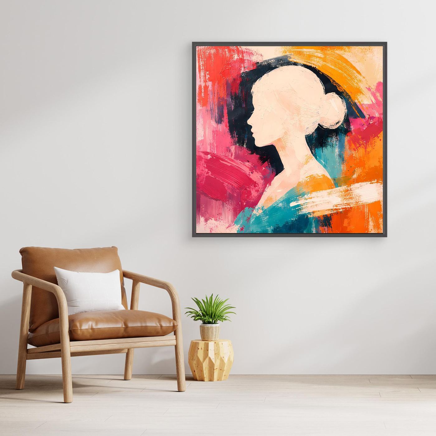 Abstract canvas wall art with woman silhouette in red, orange, teal, and pink, with black frame.