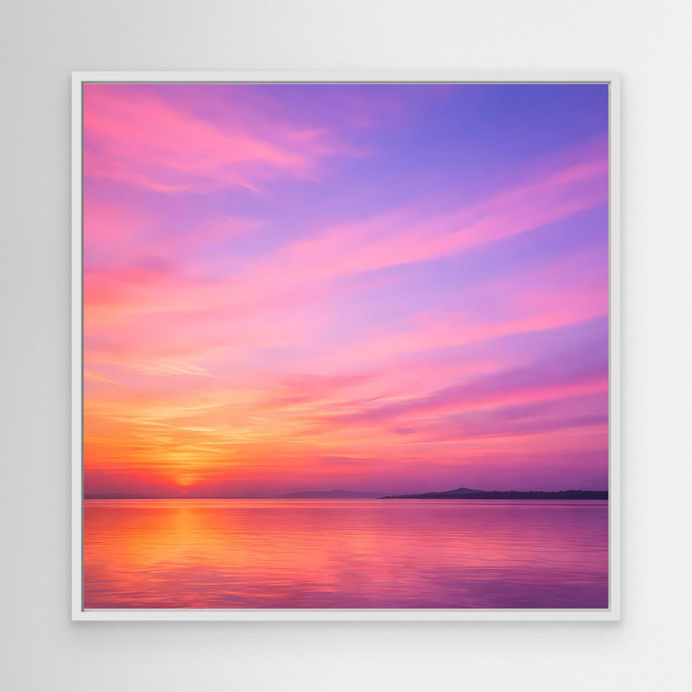 Leinwandbild „Pastel Sunset“ mit weißem Rahmen, Pastell-Sonnenuntergang über ruhig reflektierendem Wasser.