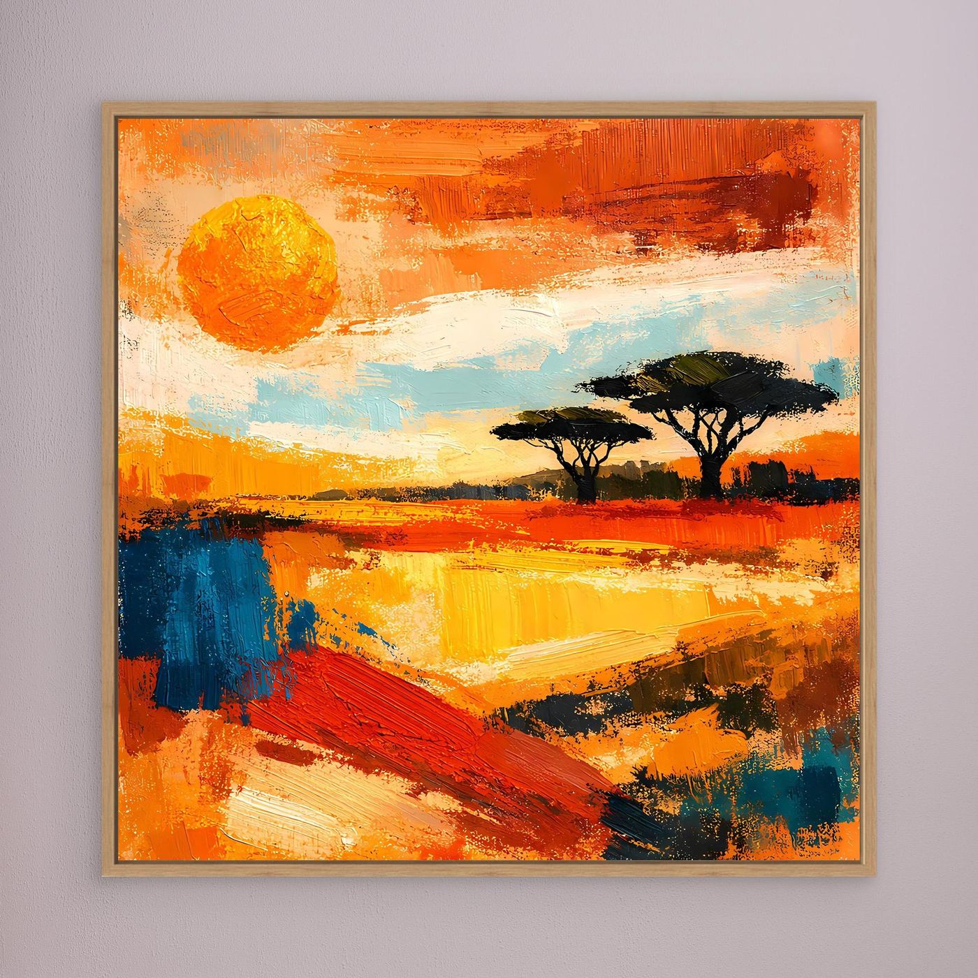 Abstract savanna sunset canvas wall art with light wood frame and silhouetted trees.