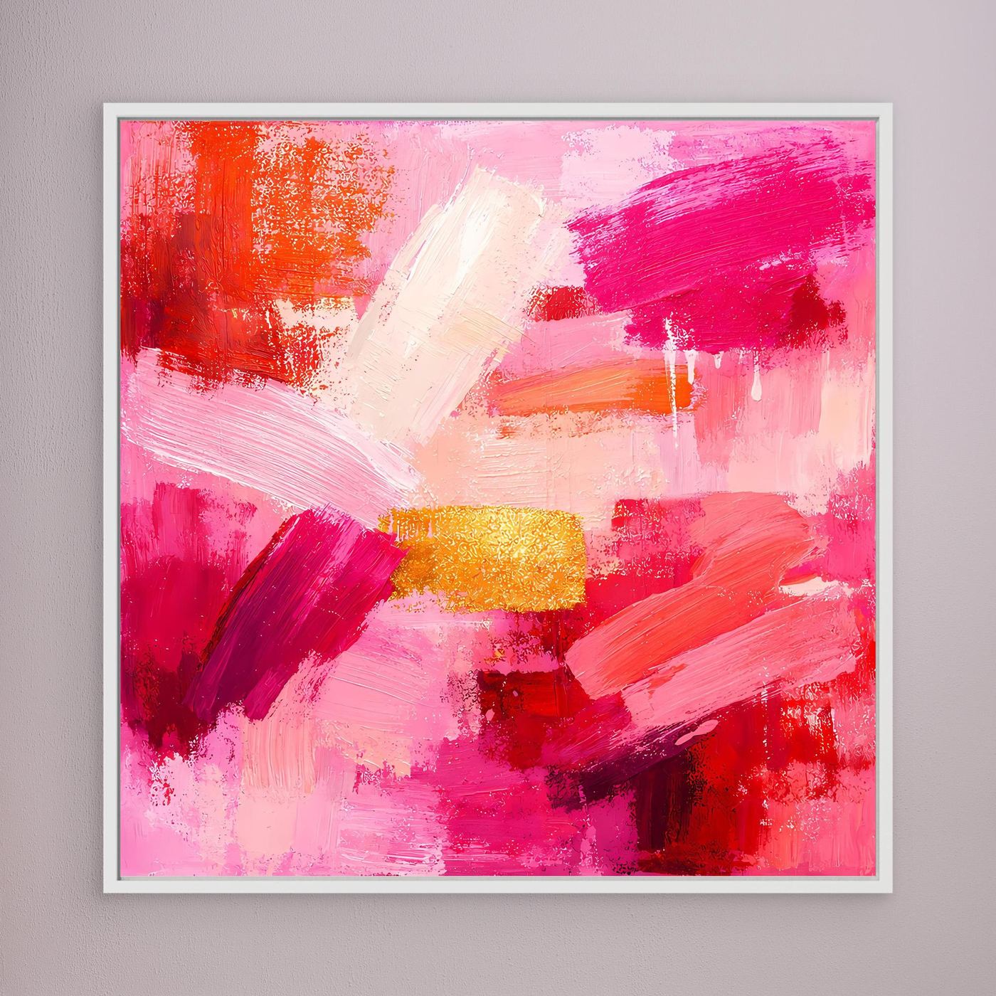 White-framed abstract canvas wall art with bright pink and red strokes and a gold accent