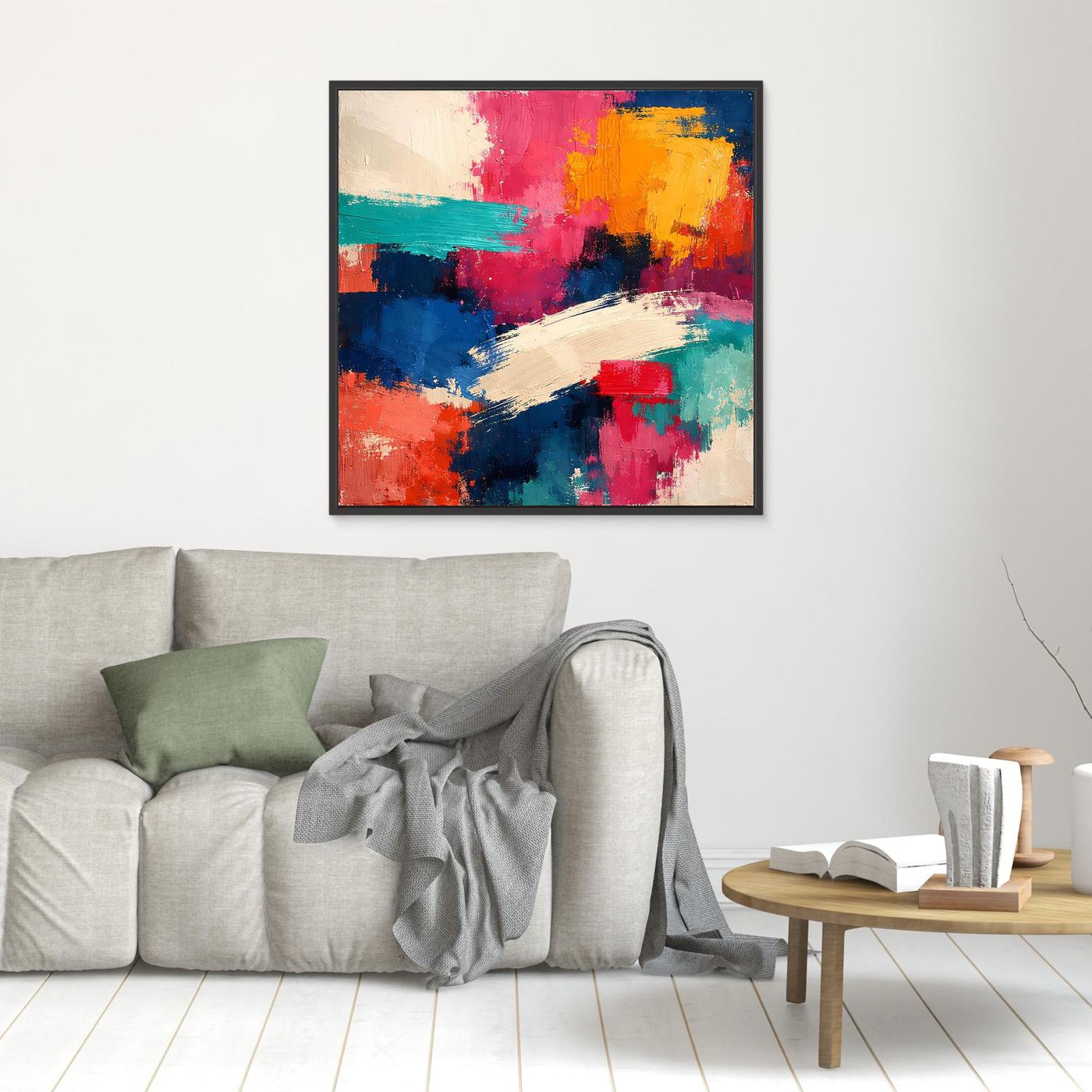 Kleines abstraktes Leinwand-Wandbild mit Farbflächen in Pink, Gelb und Blau, im schwarzen Rahmen
