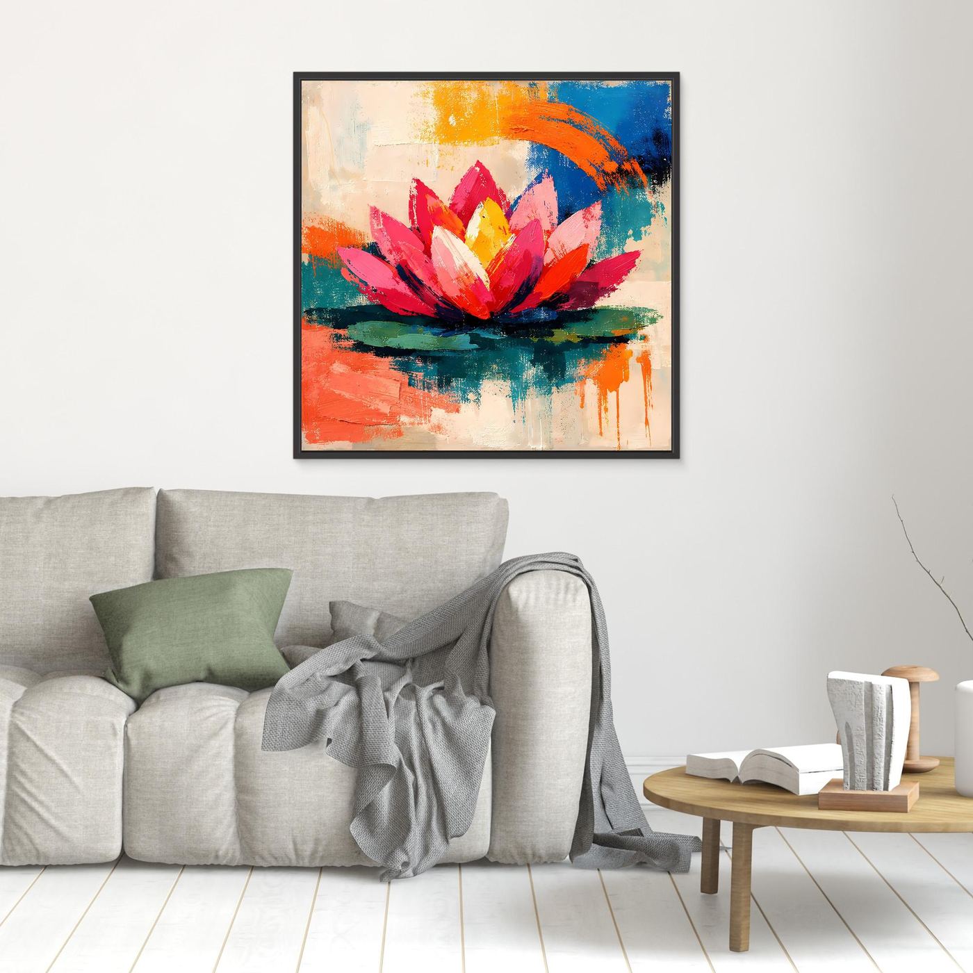 Small black-framed abstract lotus wall art with pink petals, yellow center, and orange and blue strokes
