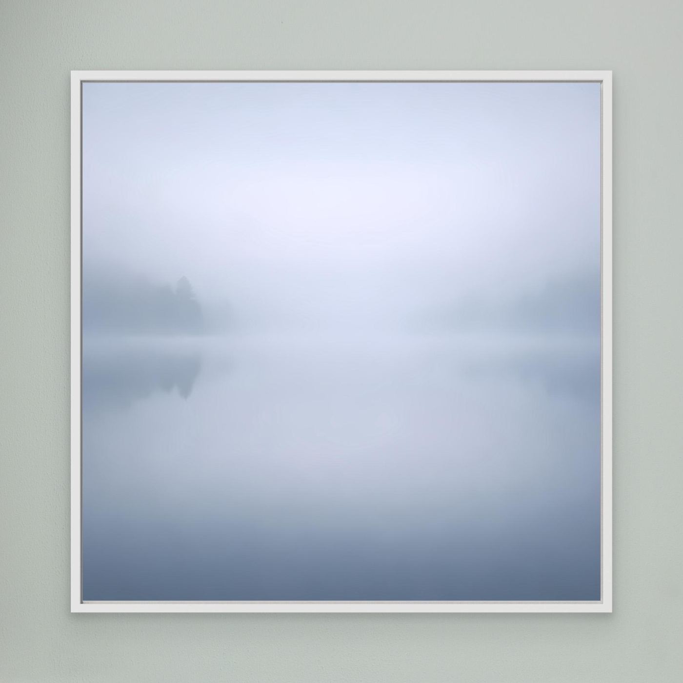 Leinwandbild Nebelsee mit Spiegelung, blau-grau, weißer Rahmen