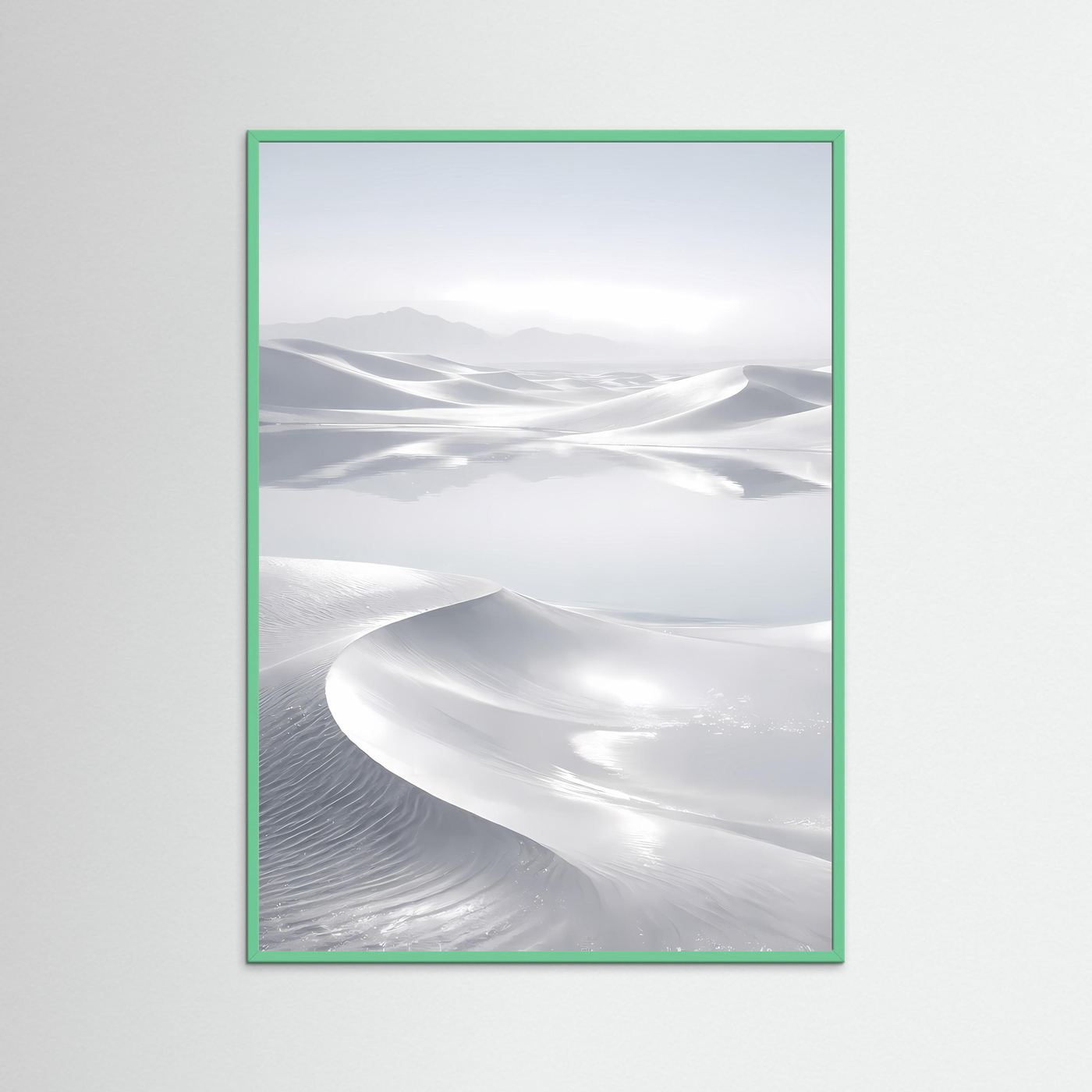 Wandposter im grünen Rahmen mit weißer Wüstenlandschaft und geschwungenen Dünen