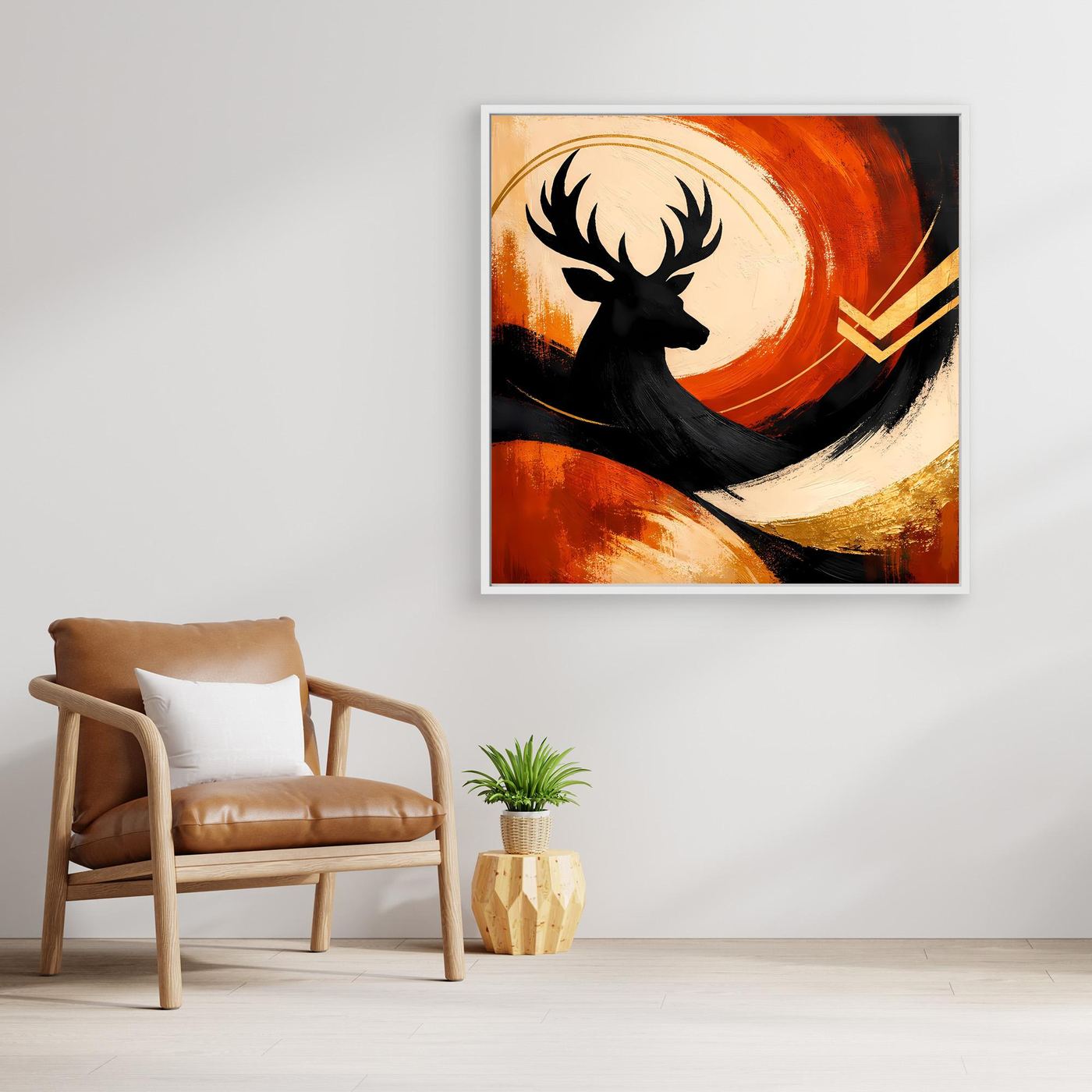 Leinwandbild mit Hirschsilhouette, orangefarbenem Kreis und goldenen Linien, schwarzer Rahmen