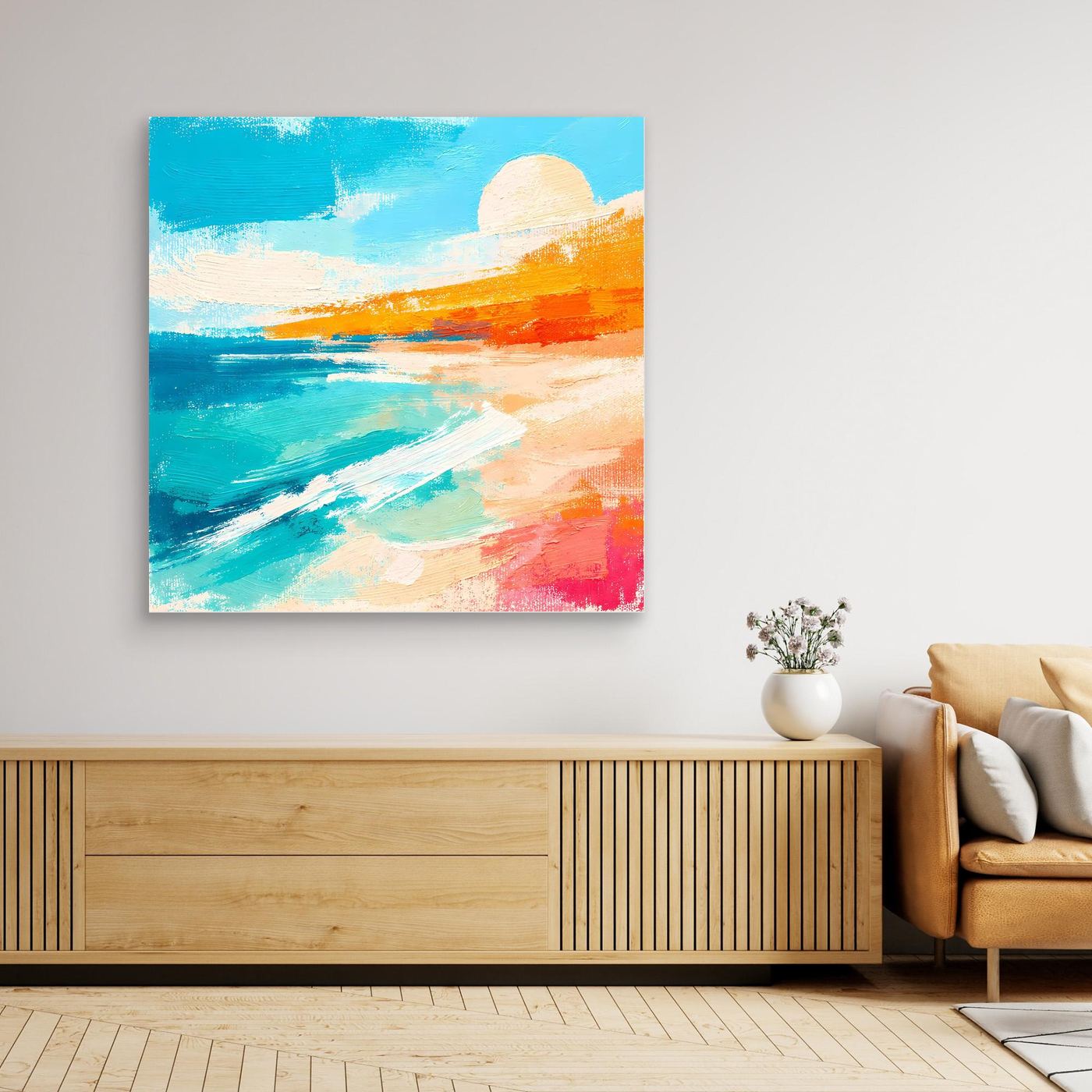 Abstract beach wall art on the wall with teal ocean, orange horizon, and white sand.