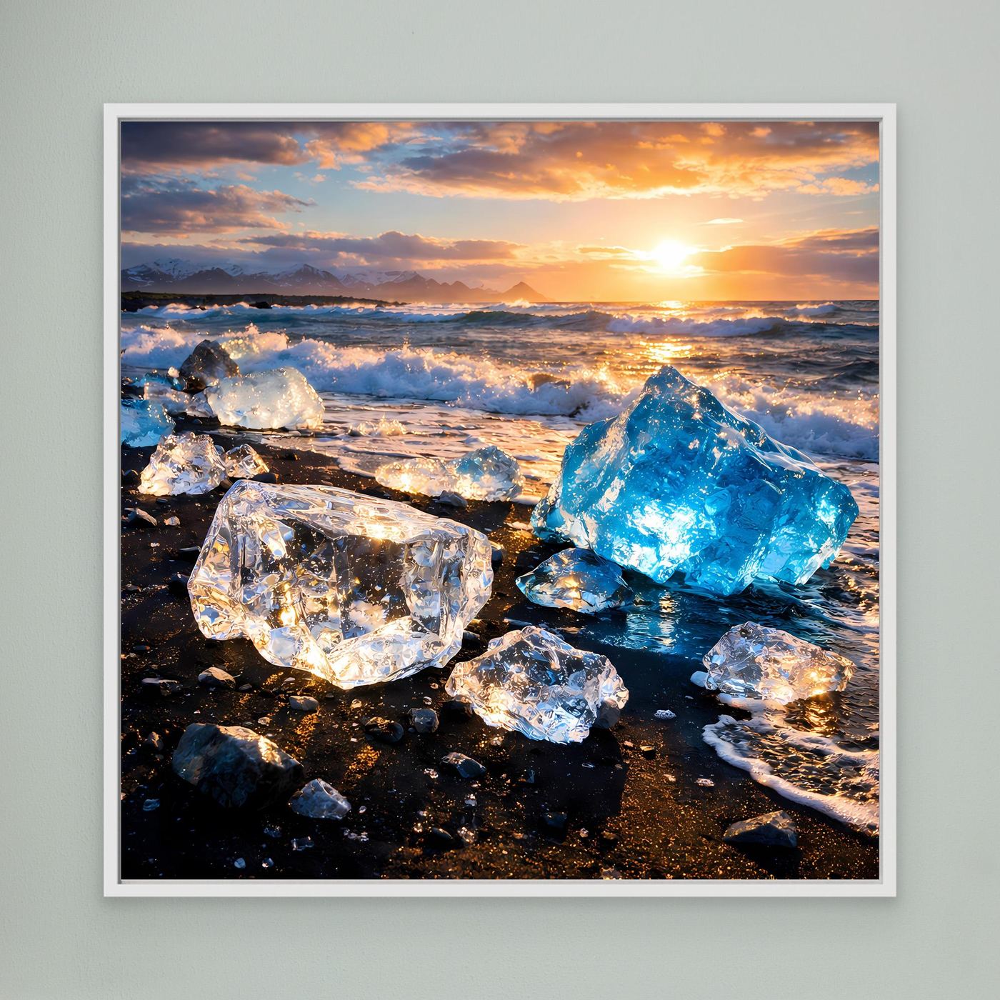 Leinwandbild mit Sonnenuntergang am Strand und großen Eisschollen, weiß gerahmt