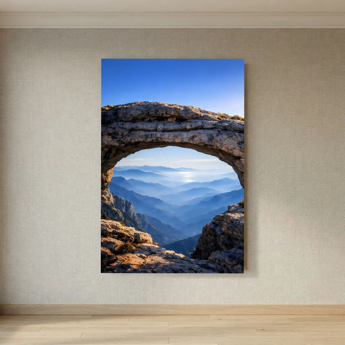 Hochformatiges Wandposter mit großem Felsbogen und tiefem Tal zwischen Bergen