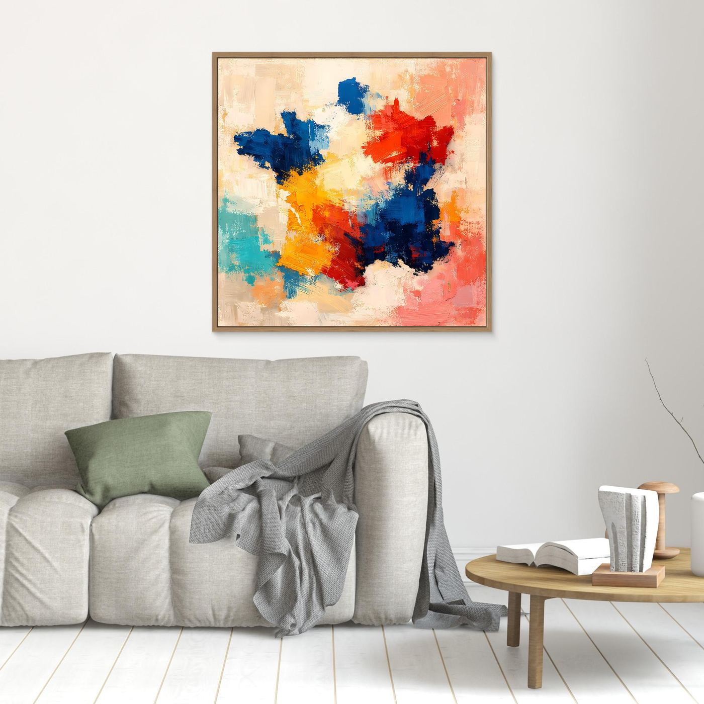 Abstract canvas wall art with blue, red, orange, yellow, and white paint in oak frame