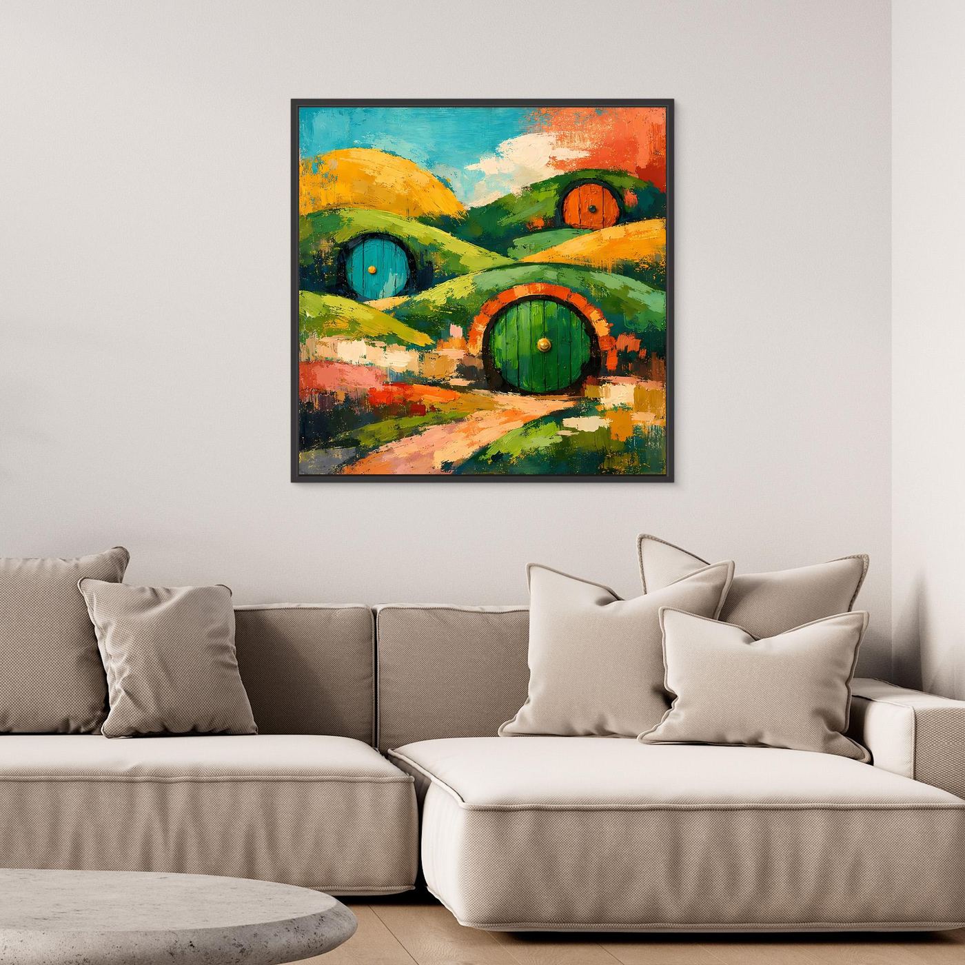 Abstraktes Wandbild auf Leinwand mit dunklem Rahmen: grüne Hügel, Fantasie-Häuser und Buntfarben