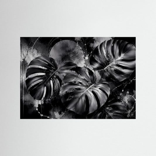 Wandbild mit Monstera-Blättern in Schwarzweiß, abstraktem Spritzdekor im Querformat