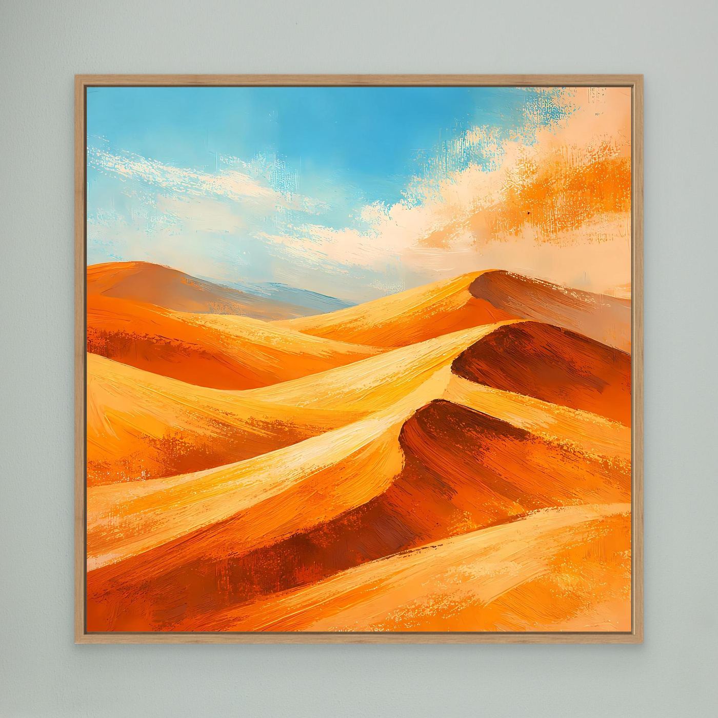 Abstract canvas wall art with blue sky and orange dunes, tan wood frame