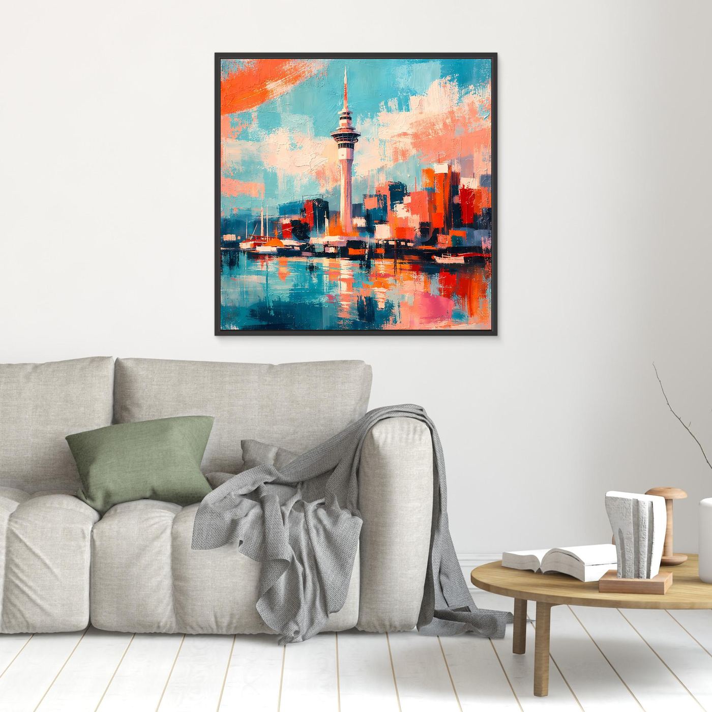 Abstraktes Wandbild mit Skyline und Sky Tower, türkis-orangefarbener Farbverlauf, schwarzer Rahmen