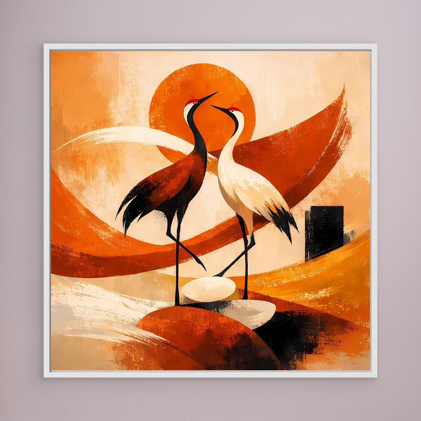 Wandbild mit zwei Kranichen im Sonnenmotiv, orangefarbene Formen, weiß gerahmt.