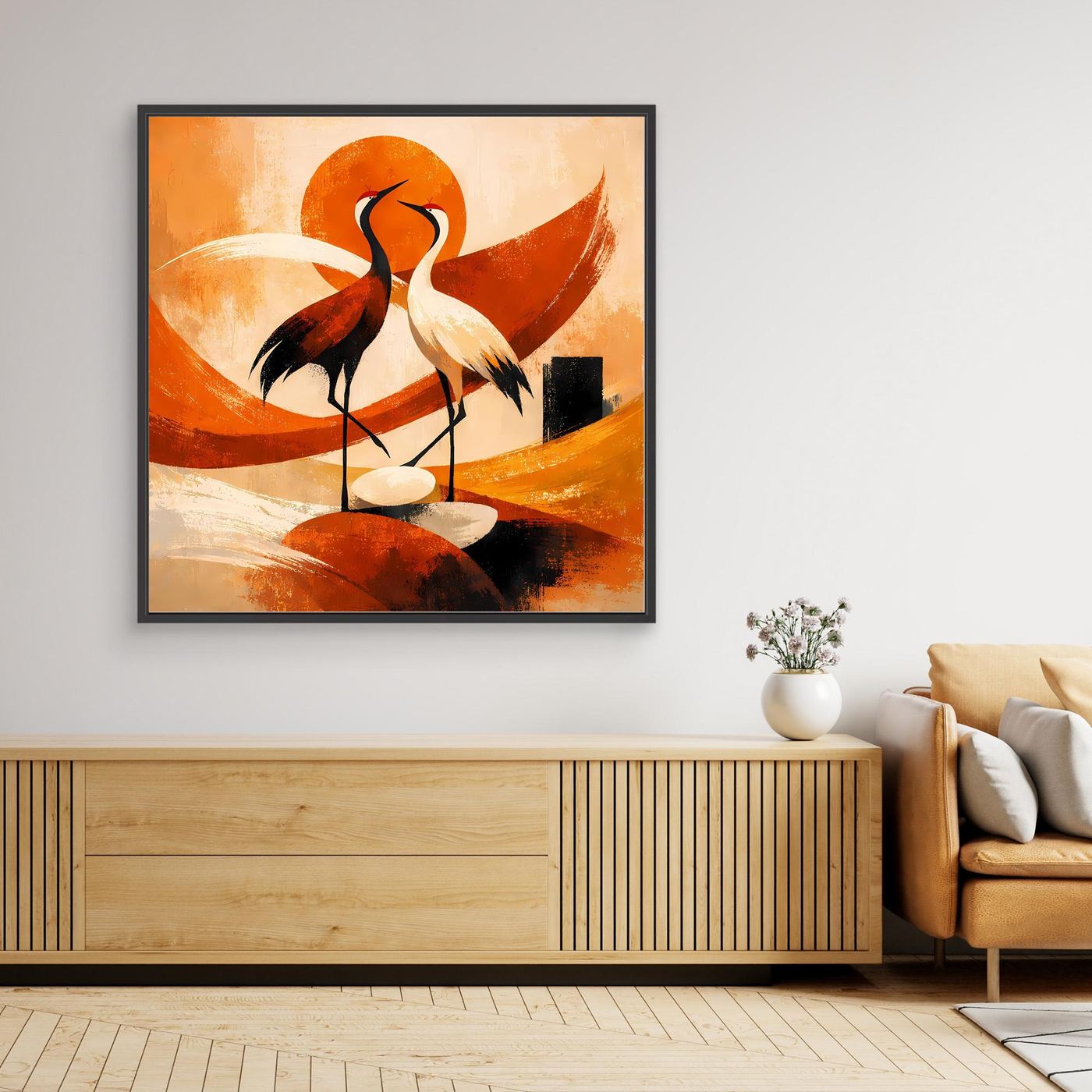 Wandbild mit Kranichen auf Leinwand, orangefarbenes Sonnenmotiv, schwarzer Rahmen