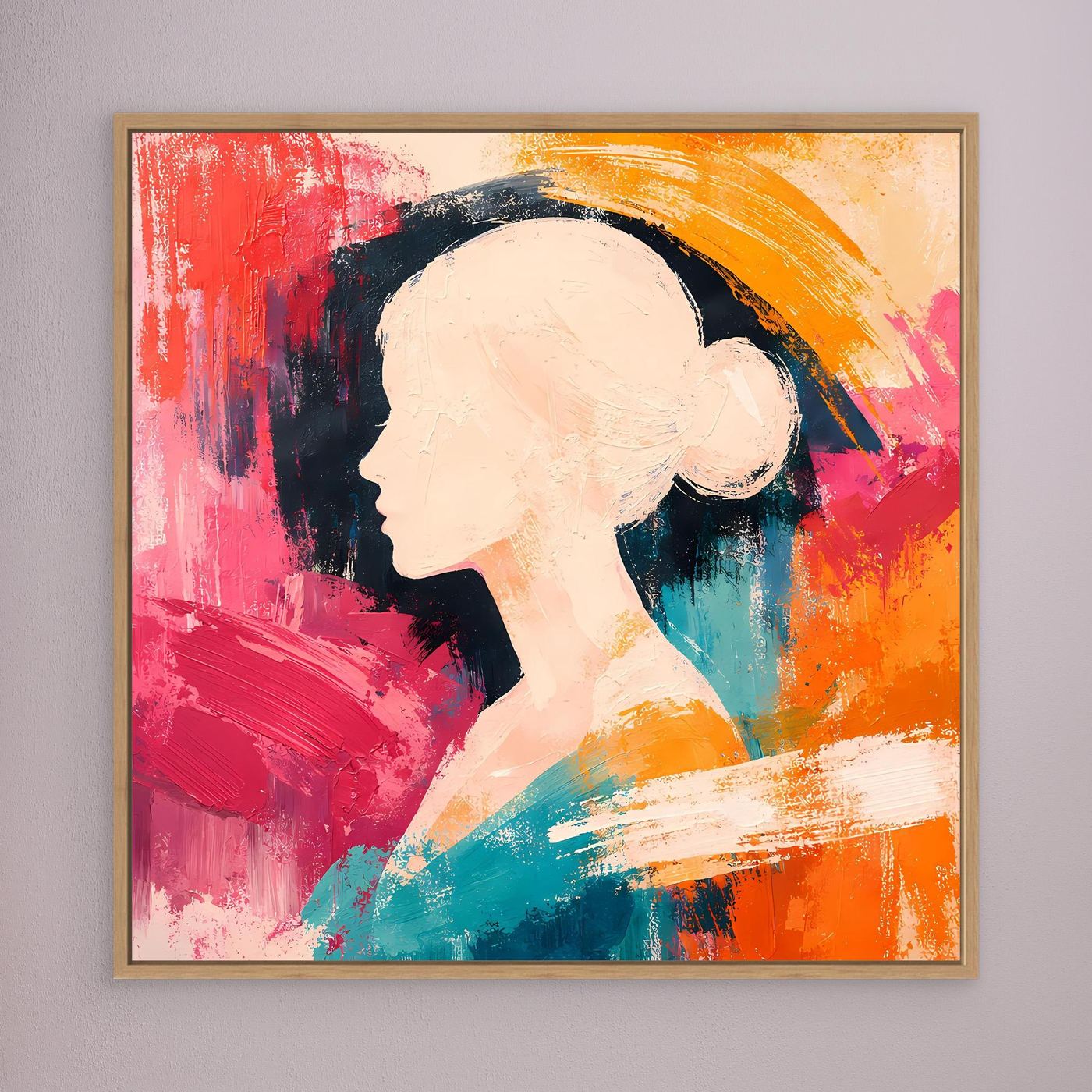Oak-framed canvas wall art with a woman profile silhouette in colorful abstract paint.