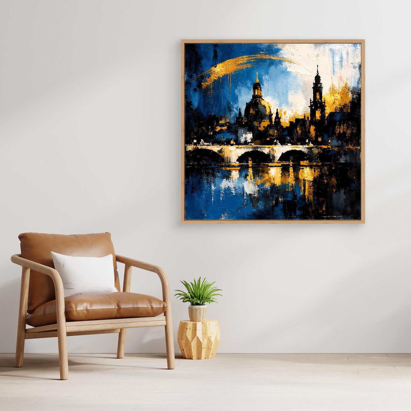 Leinwand-Wandbild mit abstrakter Skyline, blau-goldfarben, in goldbraunem Holzrahmen.