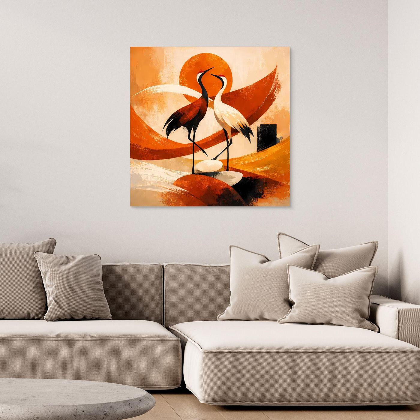 Leinwandbild mit zwei Kranichen auf orangefarbenem Hintergrund und rundem Motiv