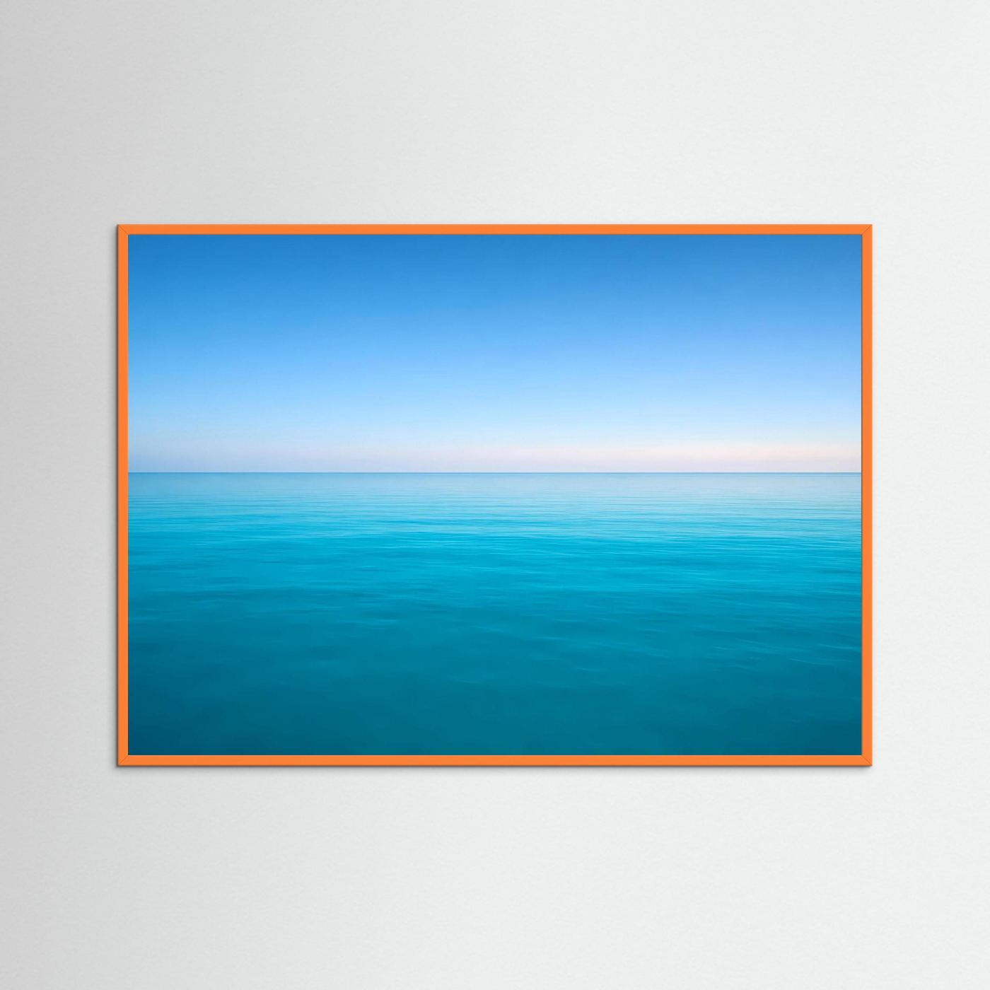 Meerhorizont-Wandbild mit orangem Rahmen und türkisblauem Wasser