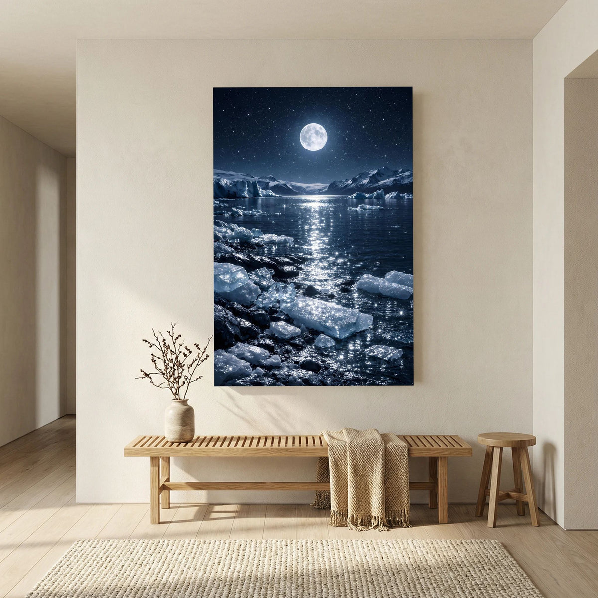 Hochformatiges Wandbild mit schwarzem Rand: Vollmond über eisigem Meer und Steinen