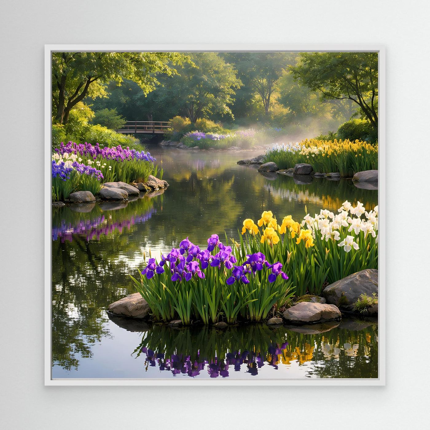 Leinwandbild im weißen Rahmen mit Irisgarten am Teich, lila, gelbe und weiße Blüten, Steine.