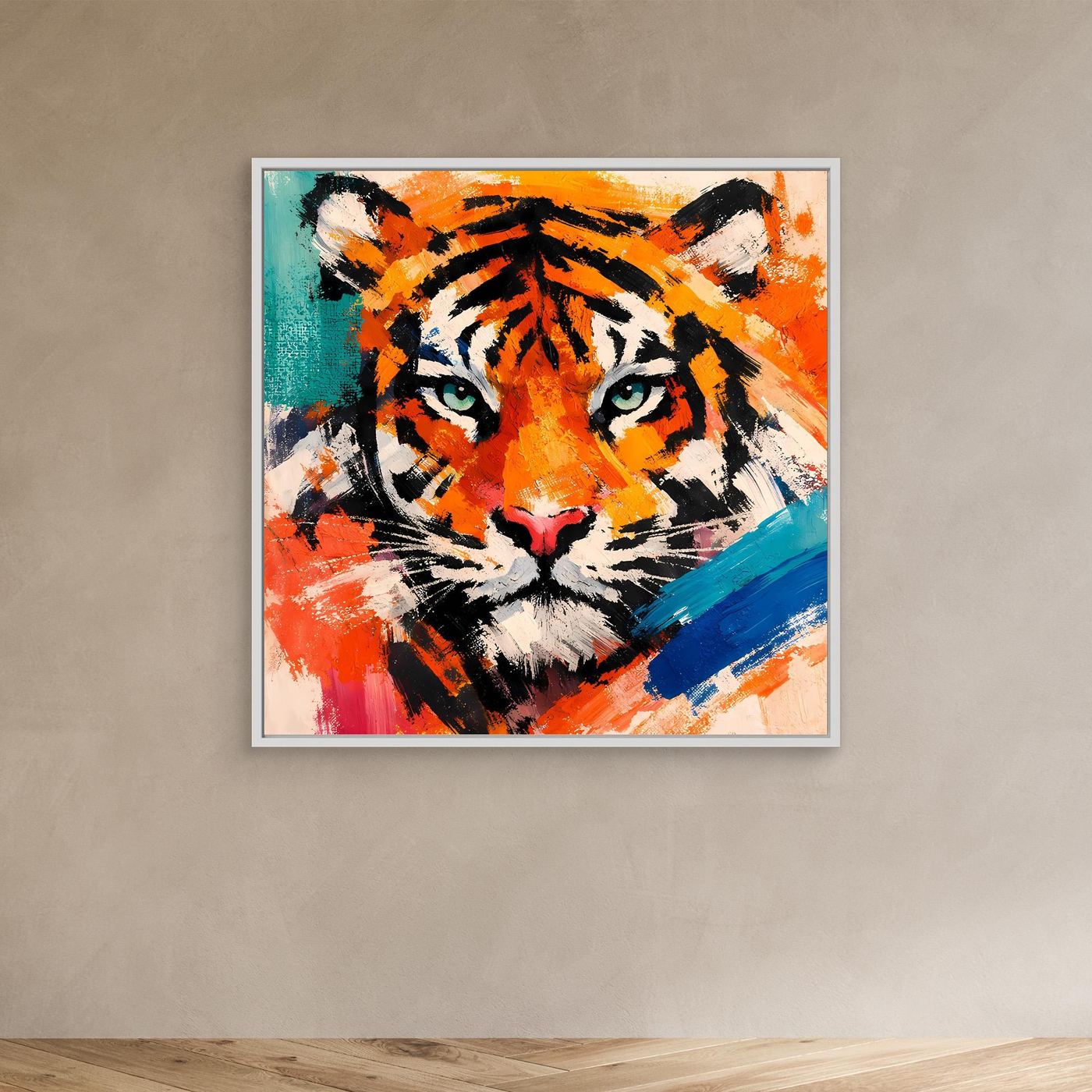 Abstract tiger wall art in a white frame, orange tiger face with teal and blue paint strokes